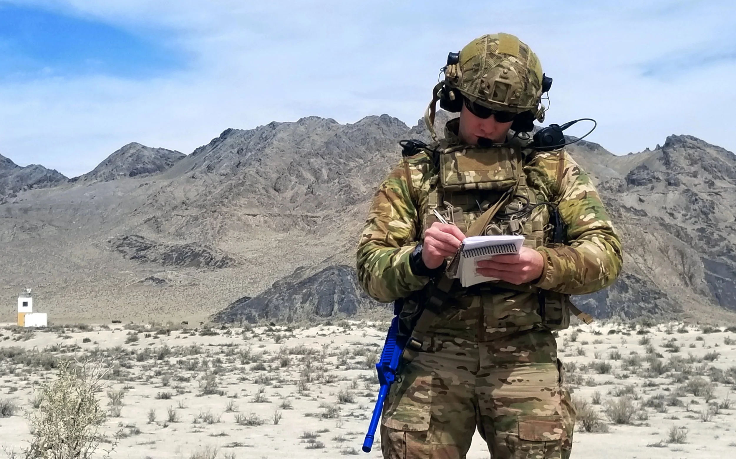 U.S. Air Force Staff Sgt. Brandon Cook, 116th Air Support Operations Squadron, 194th Wing, Washington Air National Guard, takes notes while speaking to F-35 Lightning pilots during close air support training at the Utah Test and Training Range, April
