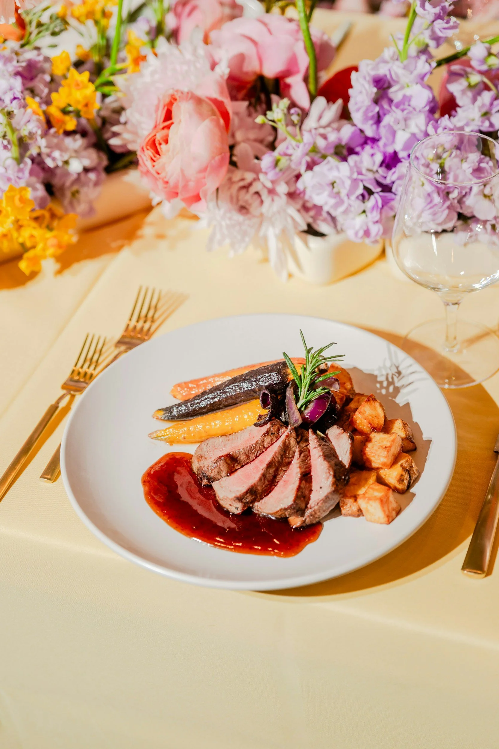 Plated event catering with beef tenderloin and roasted vegetables in Bowling Green, KY