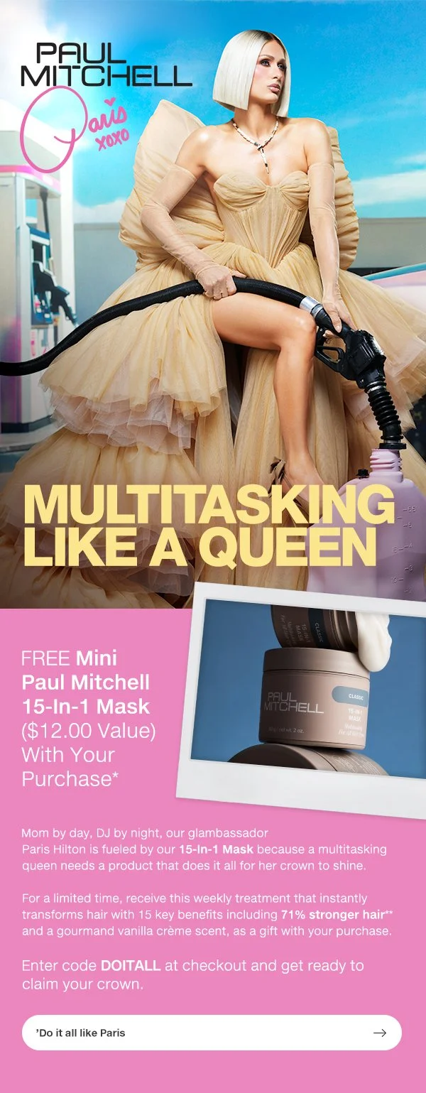 A promotional advertisement featuring musician Paul Mitchell. The image shows a woman with a bob haircut wearing a dramatic beige gown, sitting on a chair, holding a vacuum cleaner hose. The background suggests a bright, outdoor setting with a blue sky. The ad promotes a free mini Paul Mitchell 15-in-1 mask with purchase, highlighting its benefits for hair.