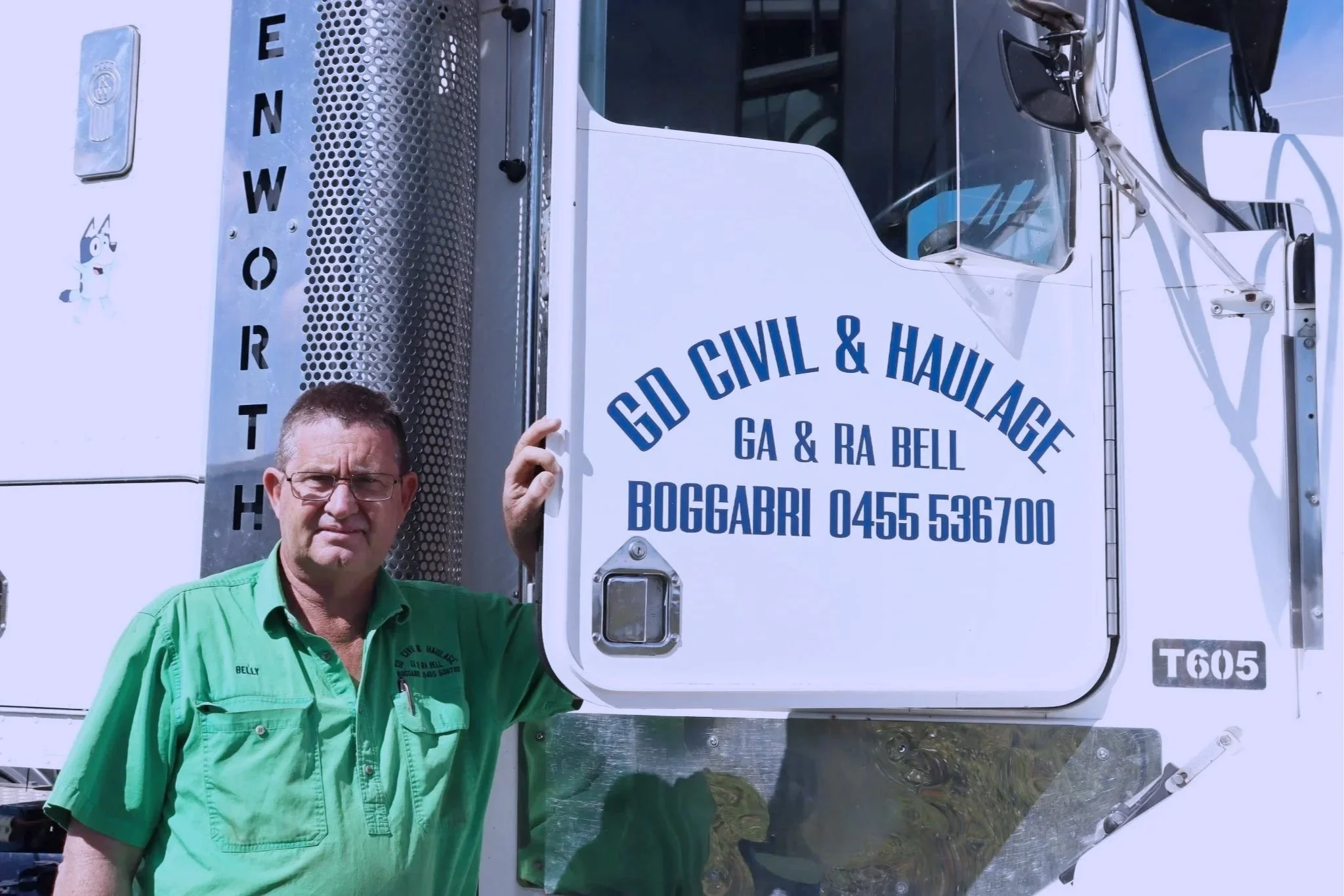 The owner of GD Civil & Haulage standing next to his truck.