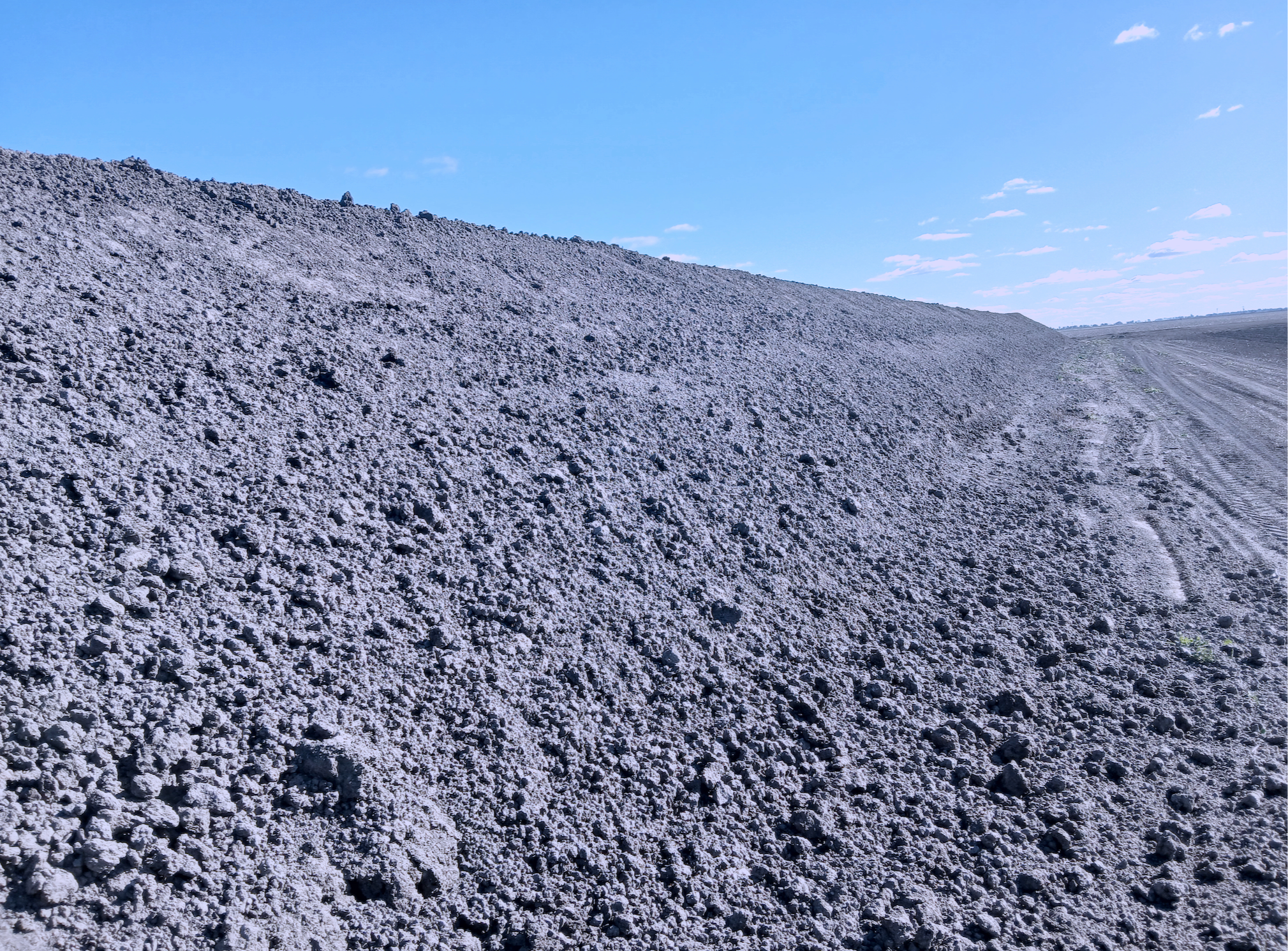An after picture of agricultural earthwork upgrades completed with a grader.