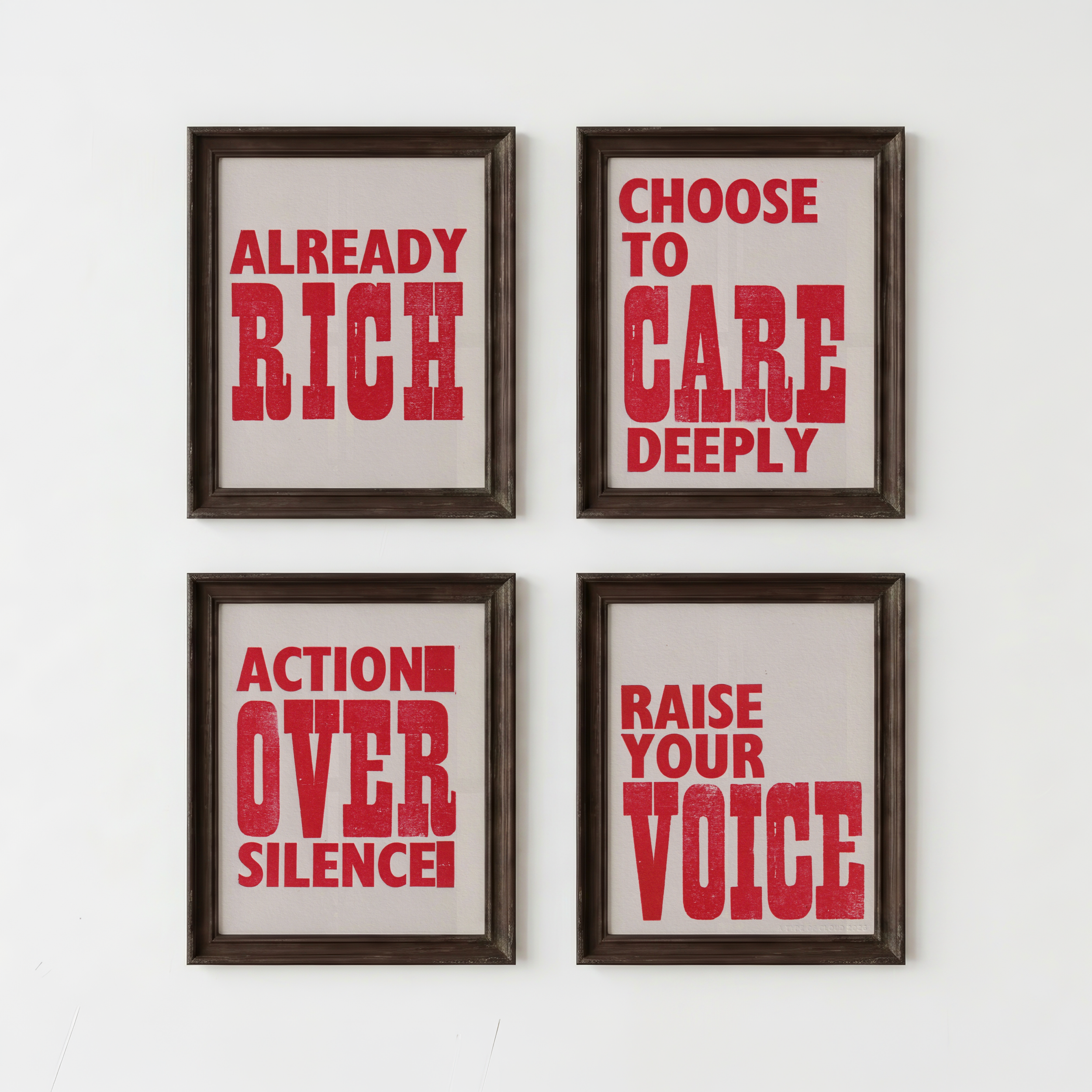 Letterpress posters with activist sayings in vintage frames