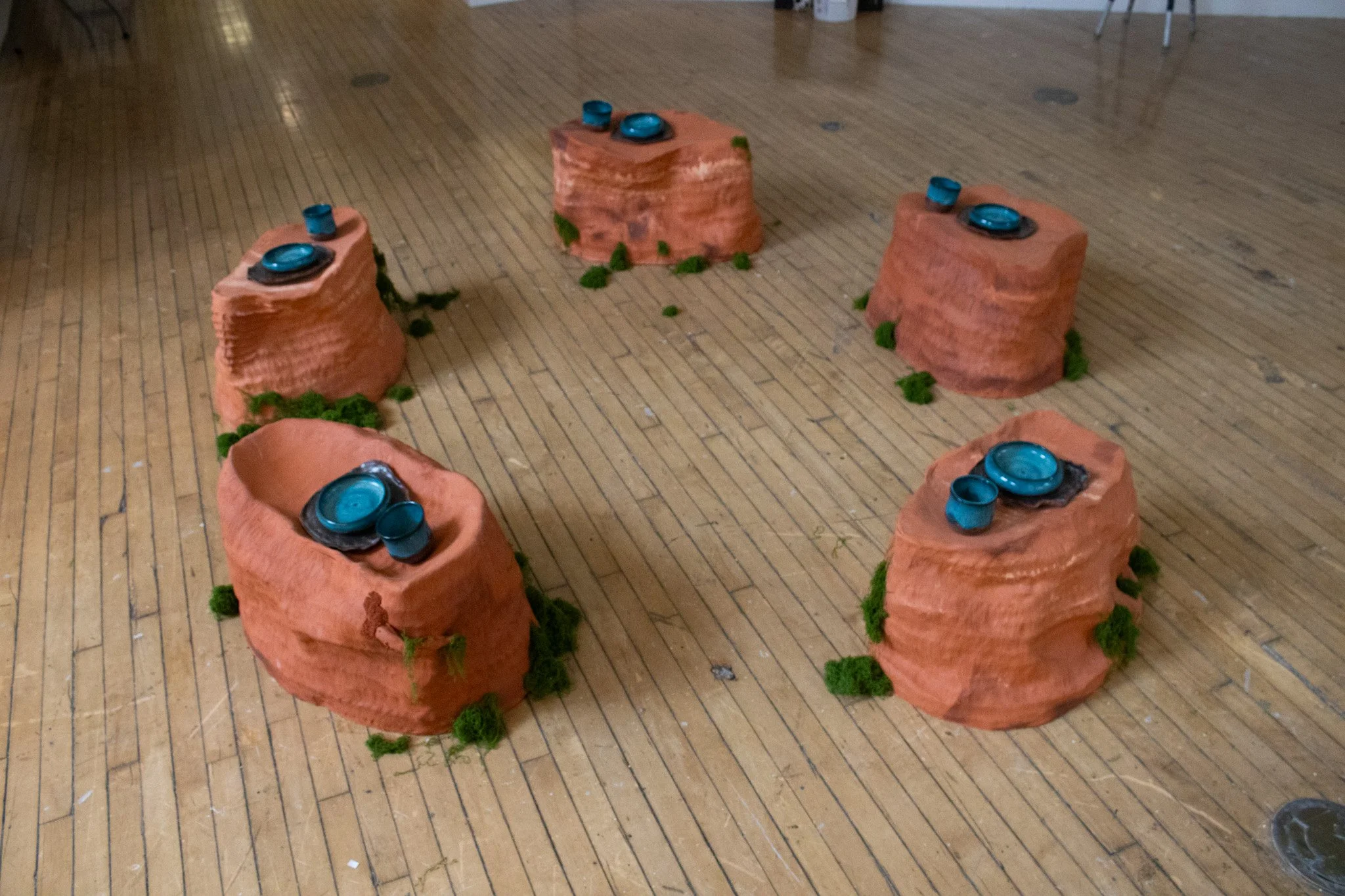 "Bottom of the Atlantic (i left a place for you here)" [installation view], terracotta (tables) & red stoneware (vessels)