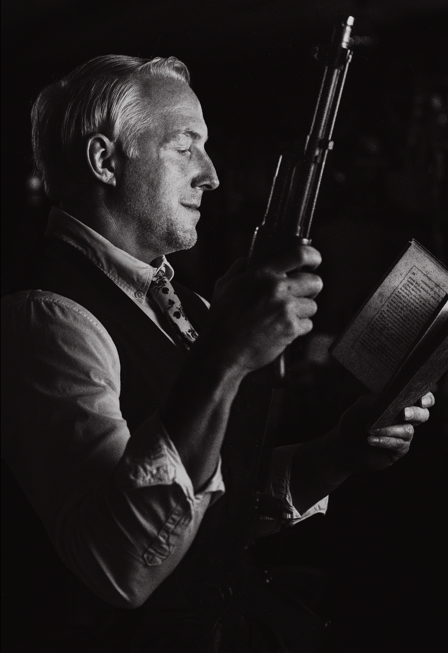 A veteran poses with an AK-47 while reading my 1849 copy of 'Advice to Young Men' by William Alcott.