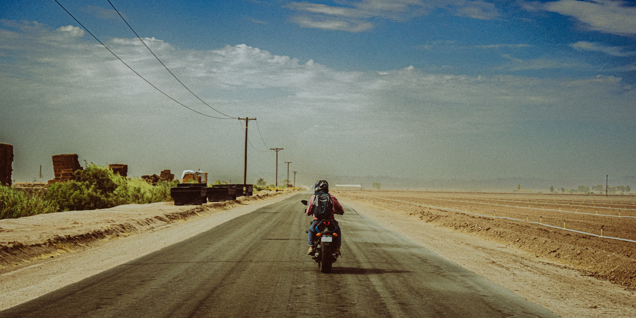 An unknown traveller passes us going north on Route 111 to Niland, located in Salton Trough of the Sonoran Desert, the last stop before entering the off grid town Slab City.