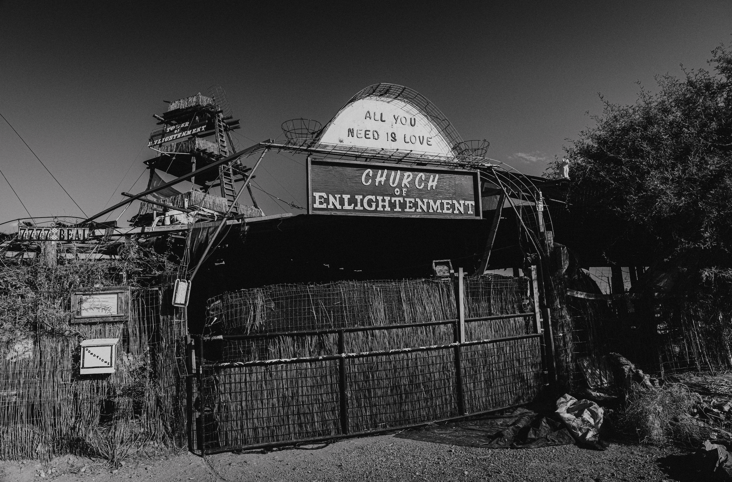 From the devoted to the deranged, residents of Slab City erect various spiritual structures. Here, a cathedral of trash titled the 'Church of Enlightenment'. Nobody was home. 