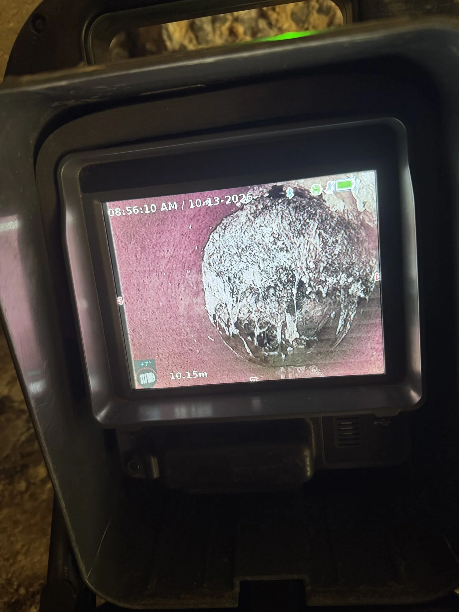 CCTV camera footage showing tree roots blocking a clay sewer pipe in Mitcham