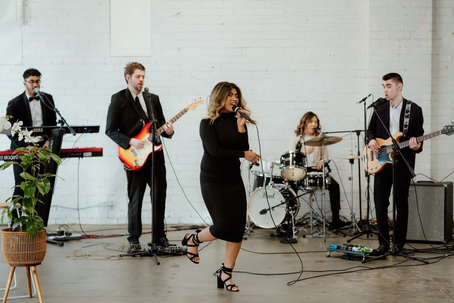 Julienne Mae performing at a wedding reception