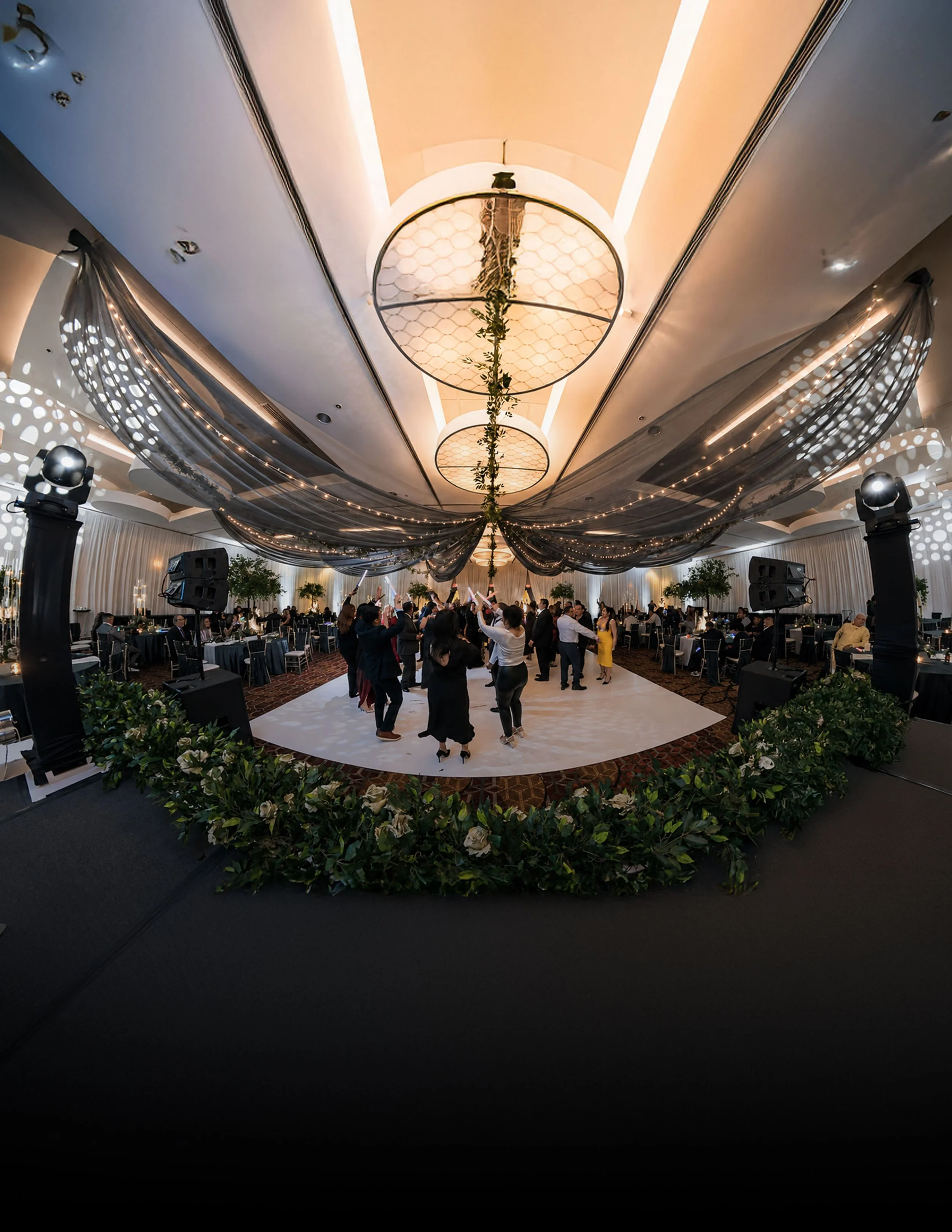 Corporate event DJ setup with professional sound, lighting, and dance floor production in Chicago