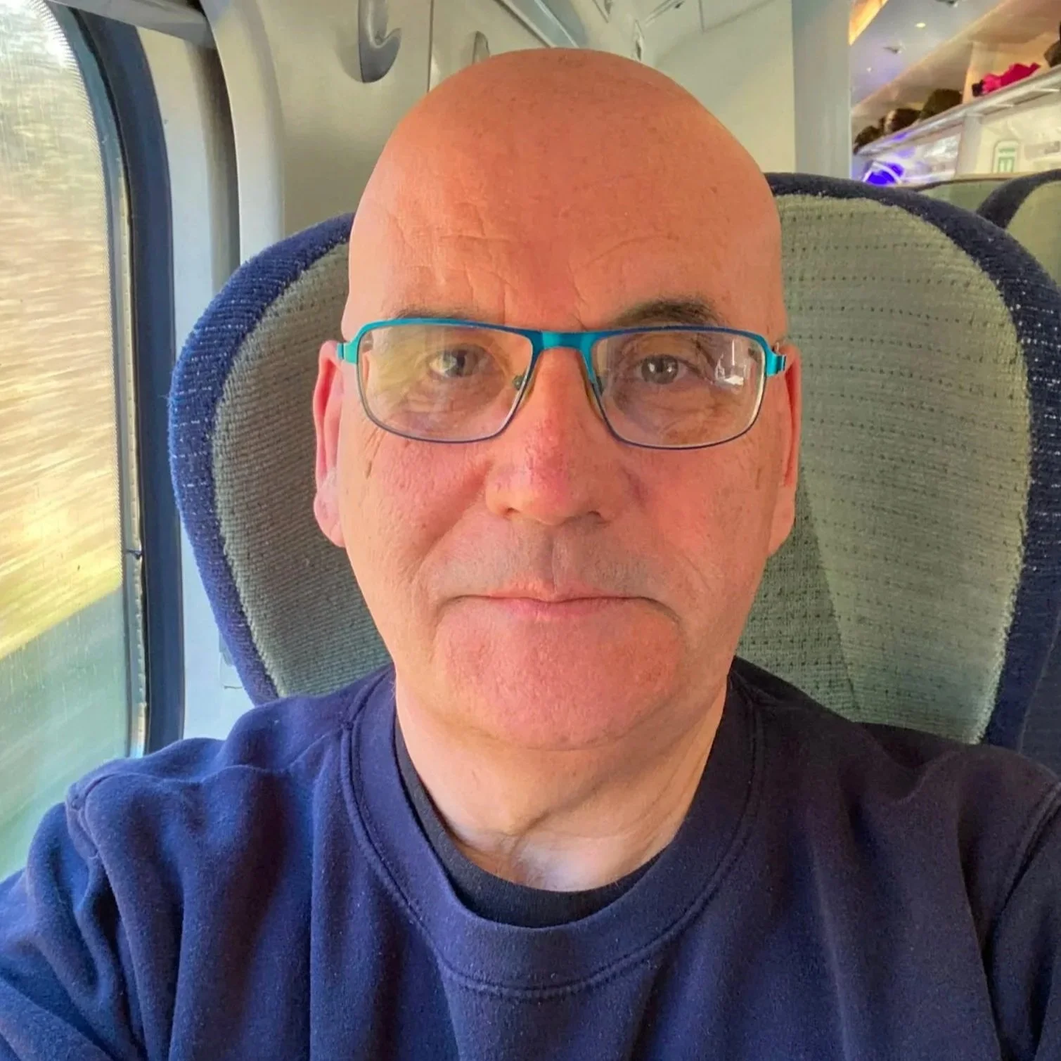 A man with a shaved head and glasses, head of WOPA Ray Armfield.