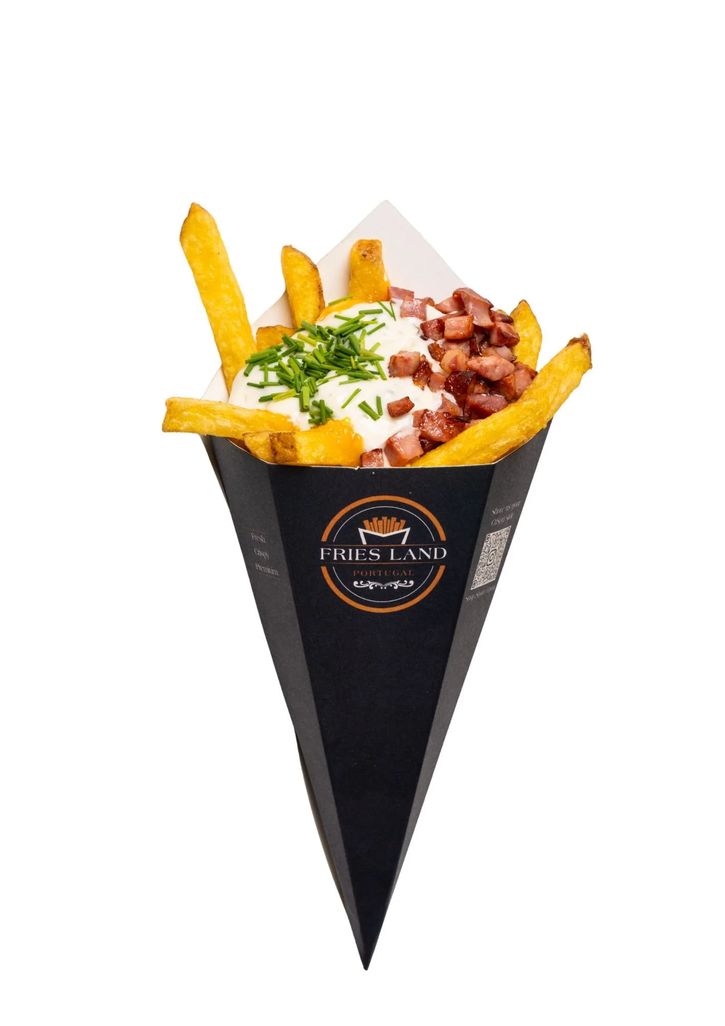 A serving of French fries topped with chopped bacon, sour cream, and chopped chives in a black paper container labeled 'Fries Land Portugal'.