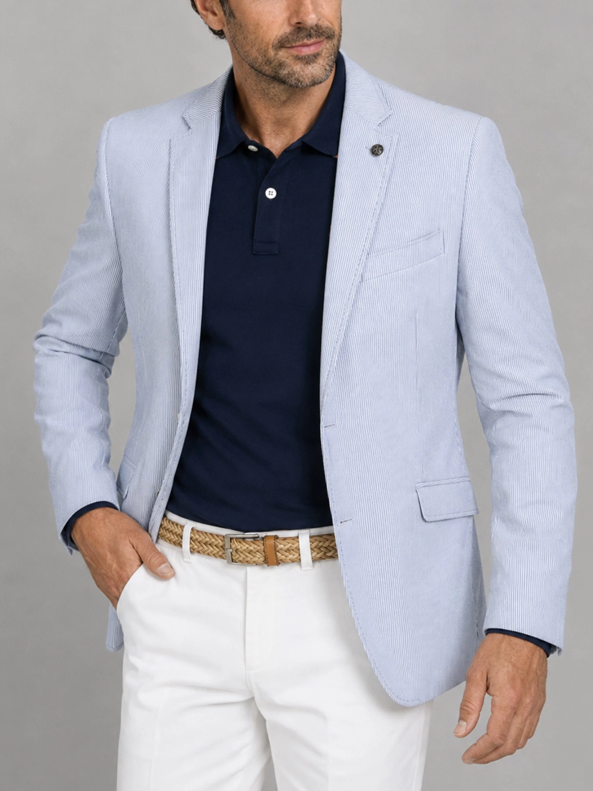 Blazer celeste de canutillo con pespuntes en solapa