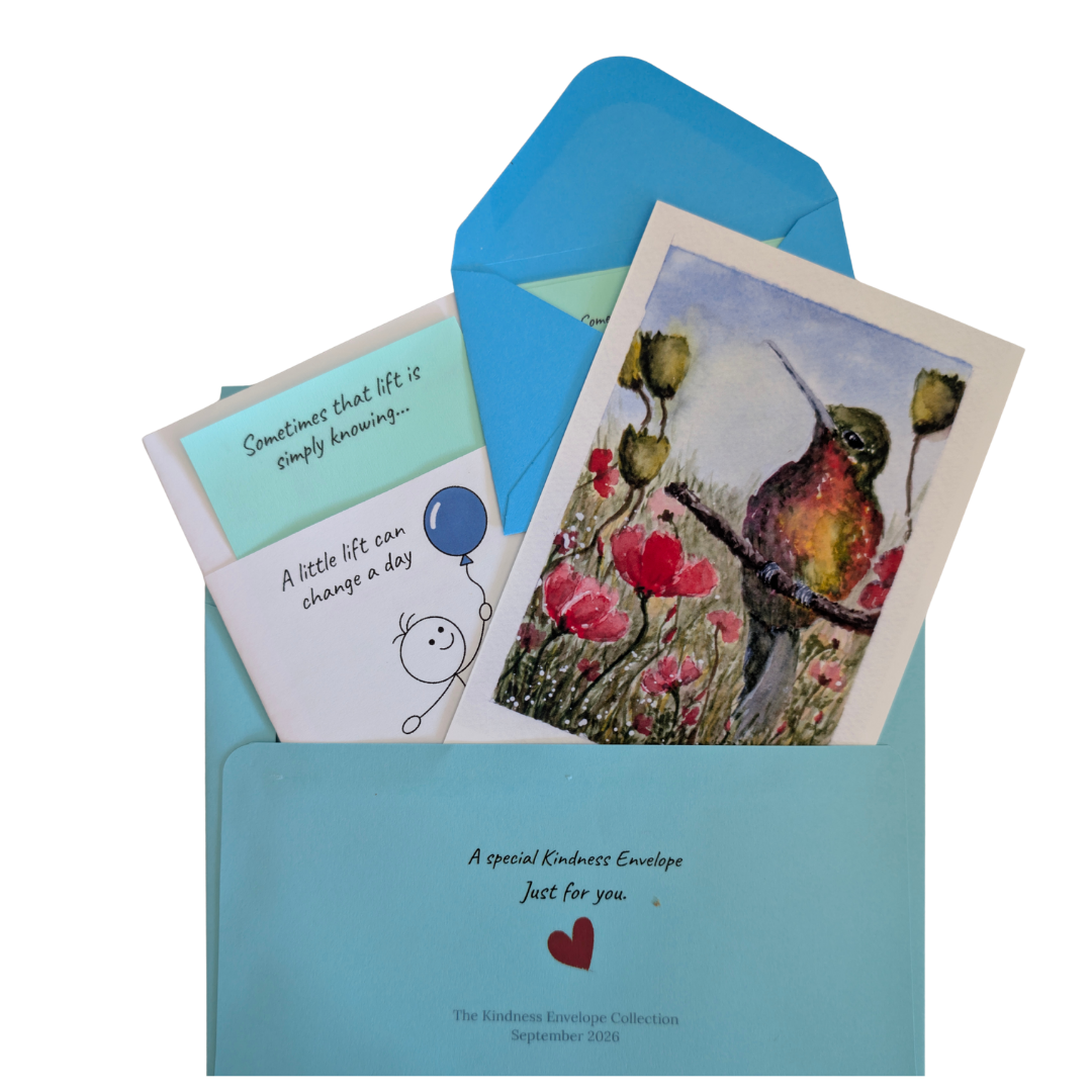 Open blue Kindness Envelope with its card, watercolor postcard, and message inserts ready to be mailed.