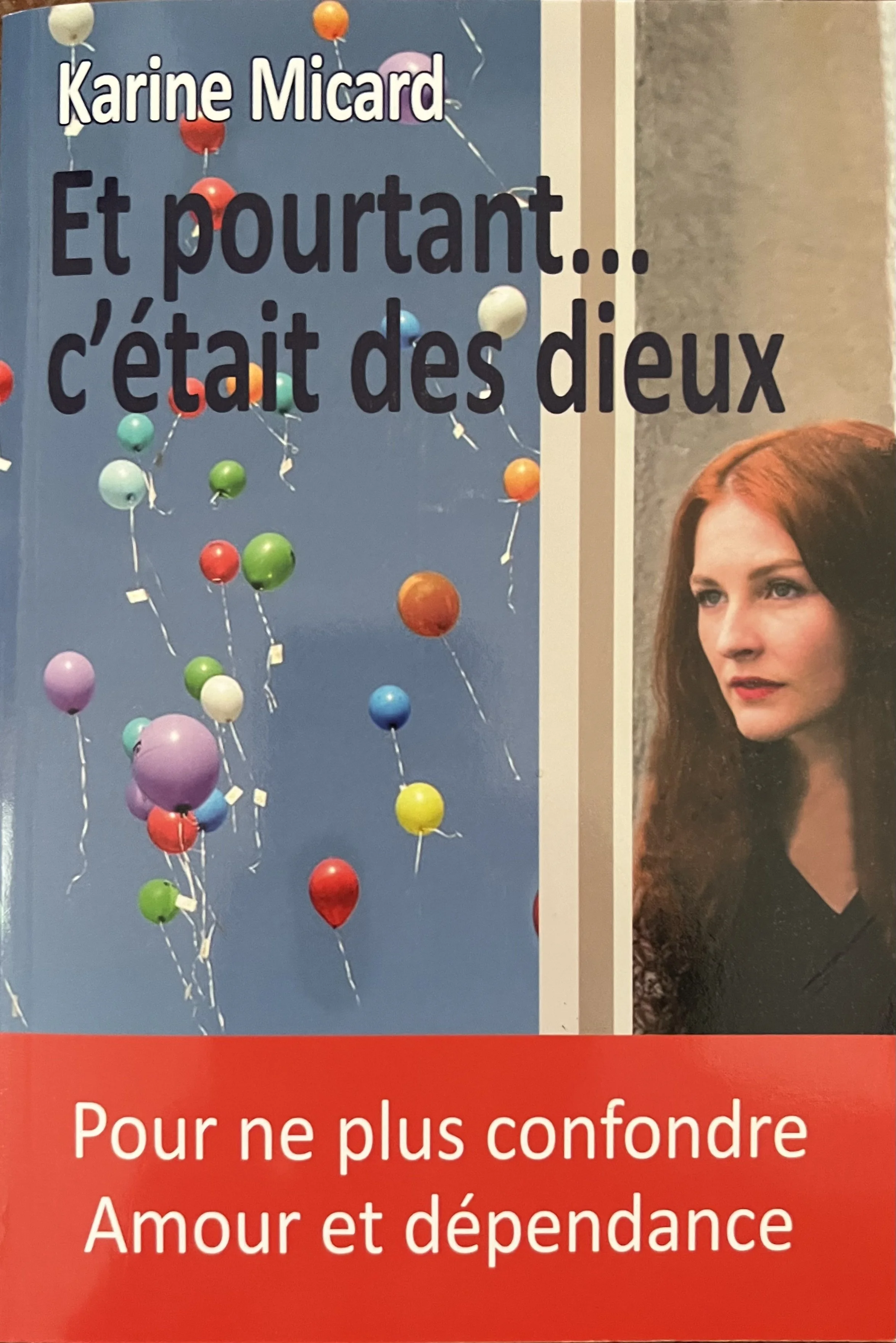 A poster with colorful balloons on a blue background, and a partial image of a woman with red hair on the right side. The poster includes the text "Karine Micard" and partially visible text in French.