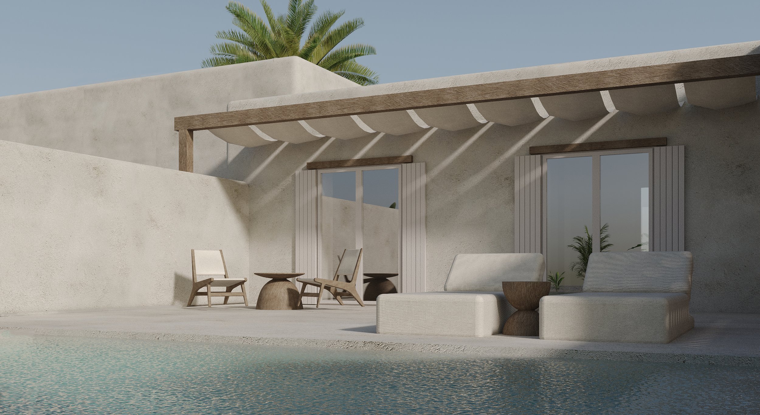 Modern outdoor patio with two lounge chairs, two small tables, a seating area with a sofa, and large windows on a light-colored wall, with a palm tree visible in the background.