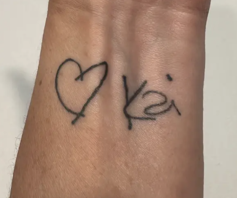 A heart tattoo on a wrist