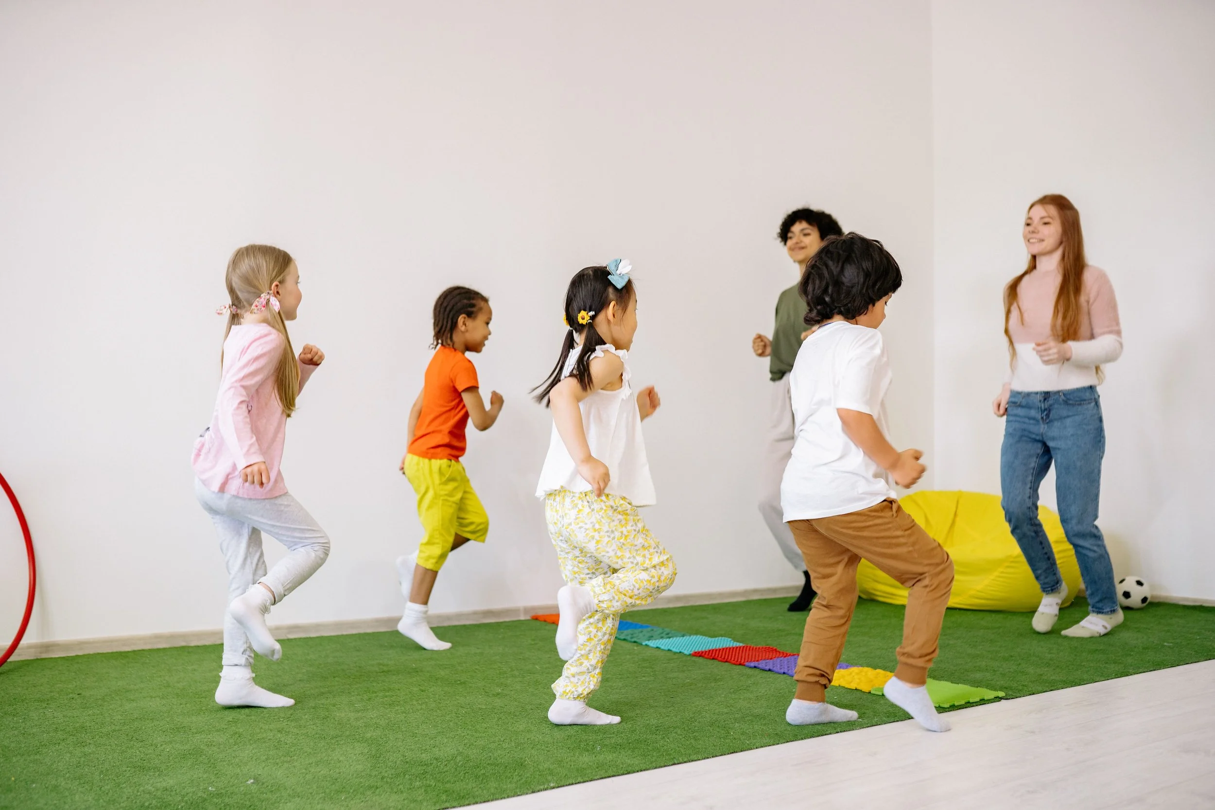 Pre-K students participating in yoga