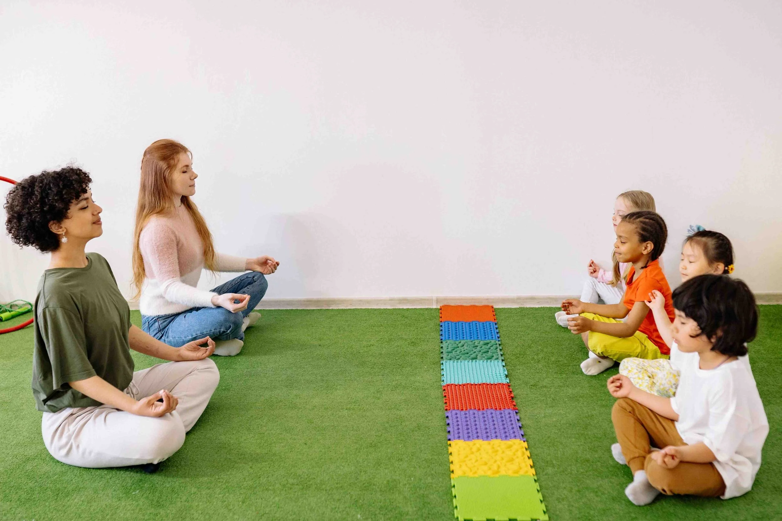 students and teachers practicing mindfulness at school