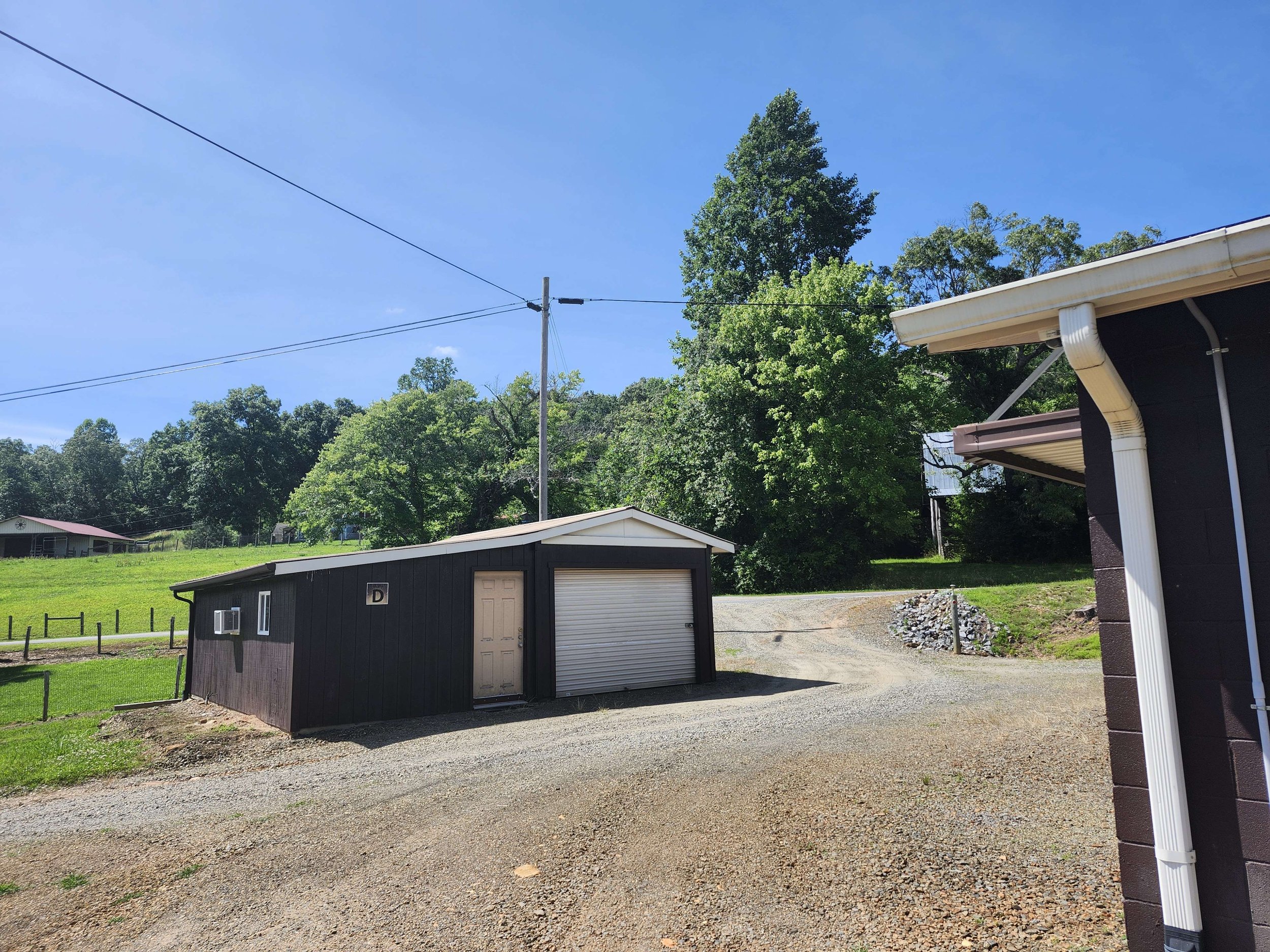 A photo of a rental storage unit from the left, with a corner of another on the right