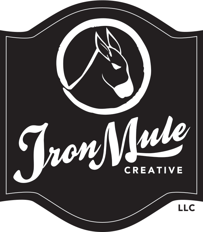 Black background logo featuring a white outline illustration of a mule's head inside a circle. Below, the text 'Iron Mule' is written in a stylized script font, with the word 'CREATIVE' in smaller uppercase letters underneath.