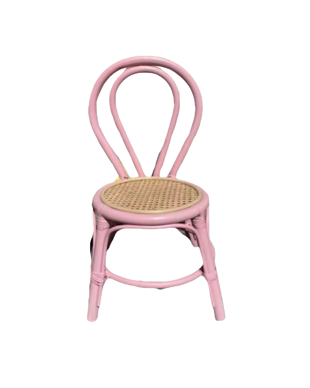 Pink bistro chair with a woven cane seat and rounded backrest.