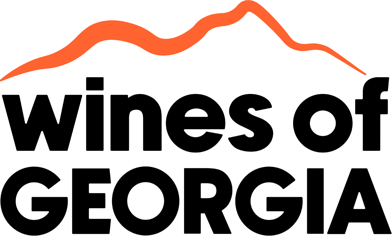 Logo of Wine of Georgia with stylized mountain range and the words 'Wines of Georgia' underneath.