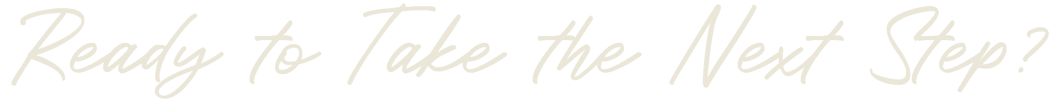 A hand holding a small plant with green leaves over a blank wooden surface with the text 'Ready to Take the Next Step?' written in cursive.
