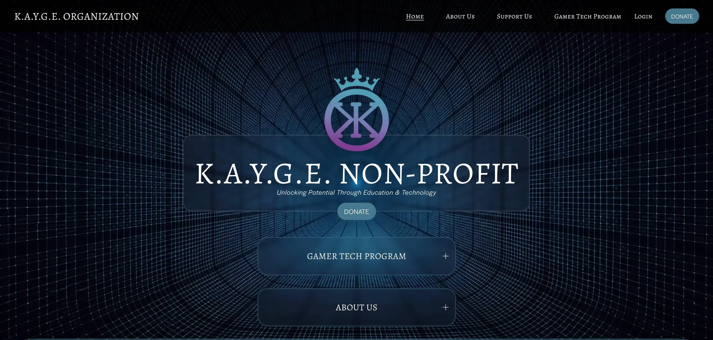 Homepage of the K.A.Y.G.E. organization website with a dark digital grid background, logo featuring a crowned circle with intertwined symbols, and navigation menu options including Home, About Us, Support Us, Gamer Tech Program, Login, and a Donate button.