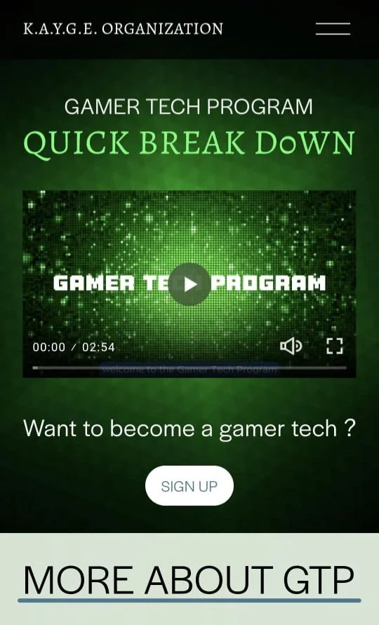 A promotional screen for K.A.Y.G.E. Organization's gamer tech program called Quick Break Down, featuring a video player with a pixelated green background and a paragraph inviting viewers to become gamer techs with a sign-up button.