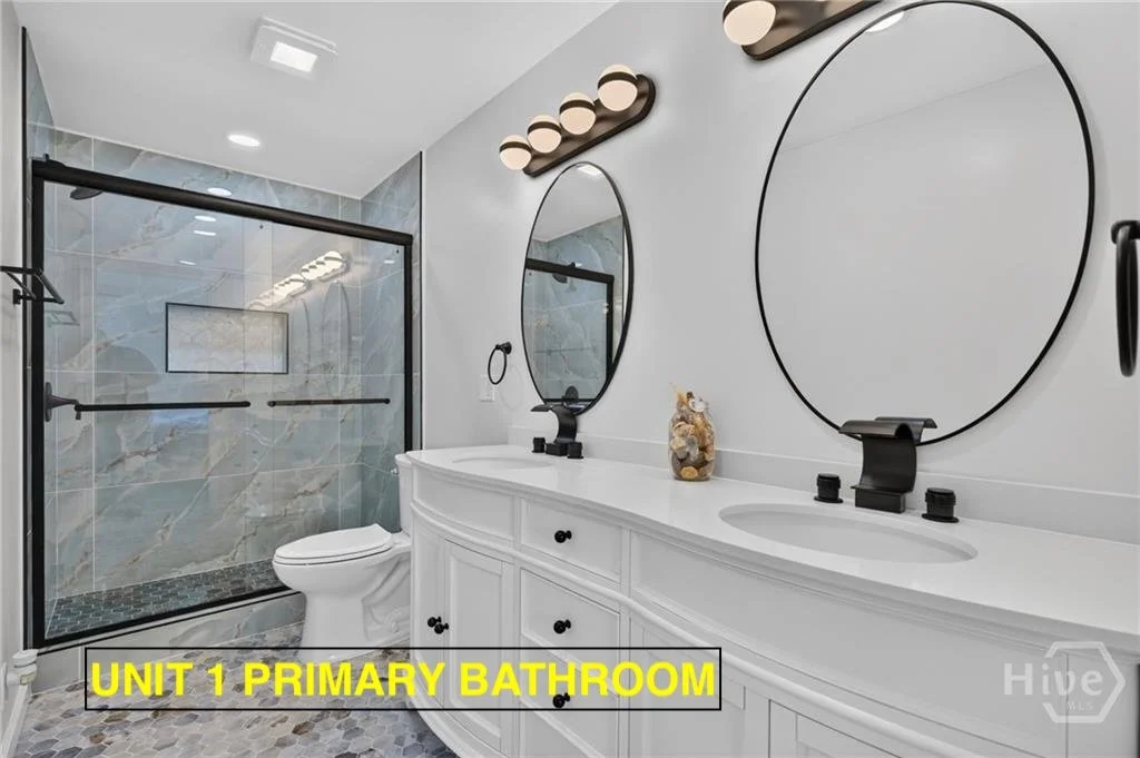 303 3RD ST UNIT 1 PRIMARY BATHROOM.jpeg