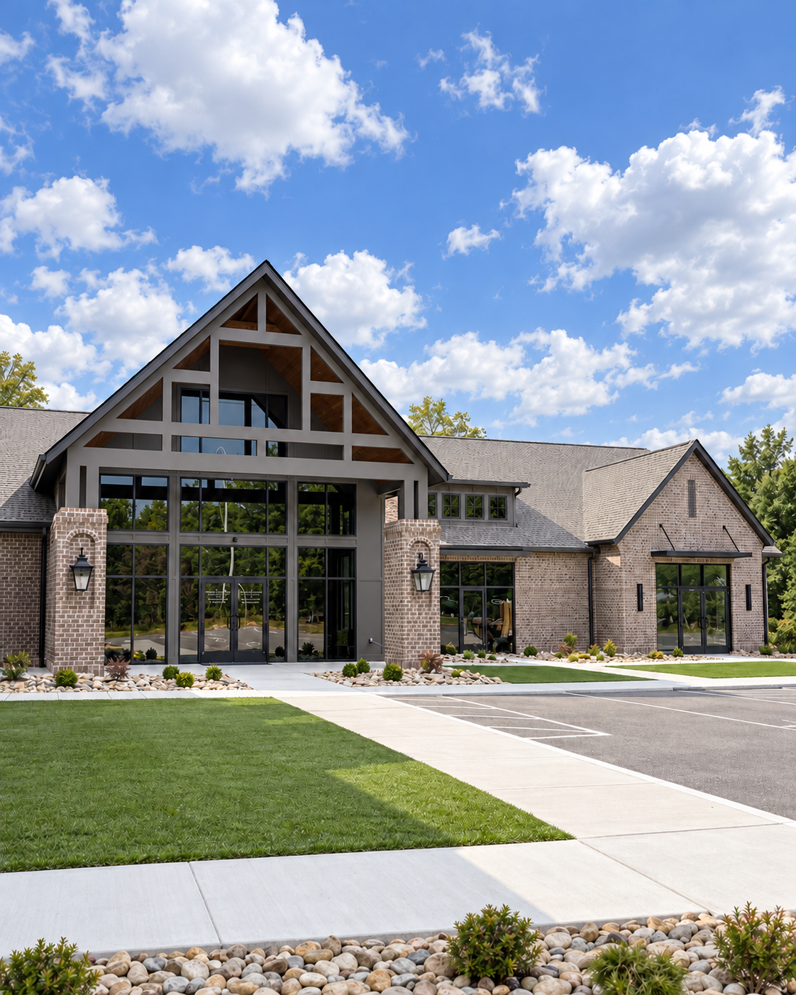 Exterior of Legacy Family Dental with a timber-framed entrance, stone columns, and large windows.