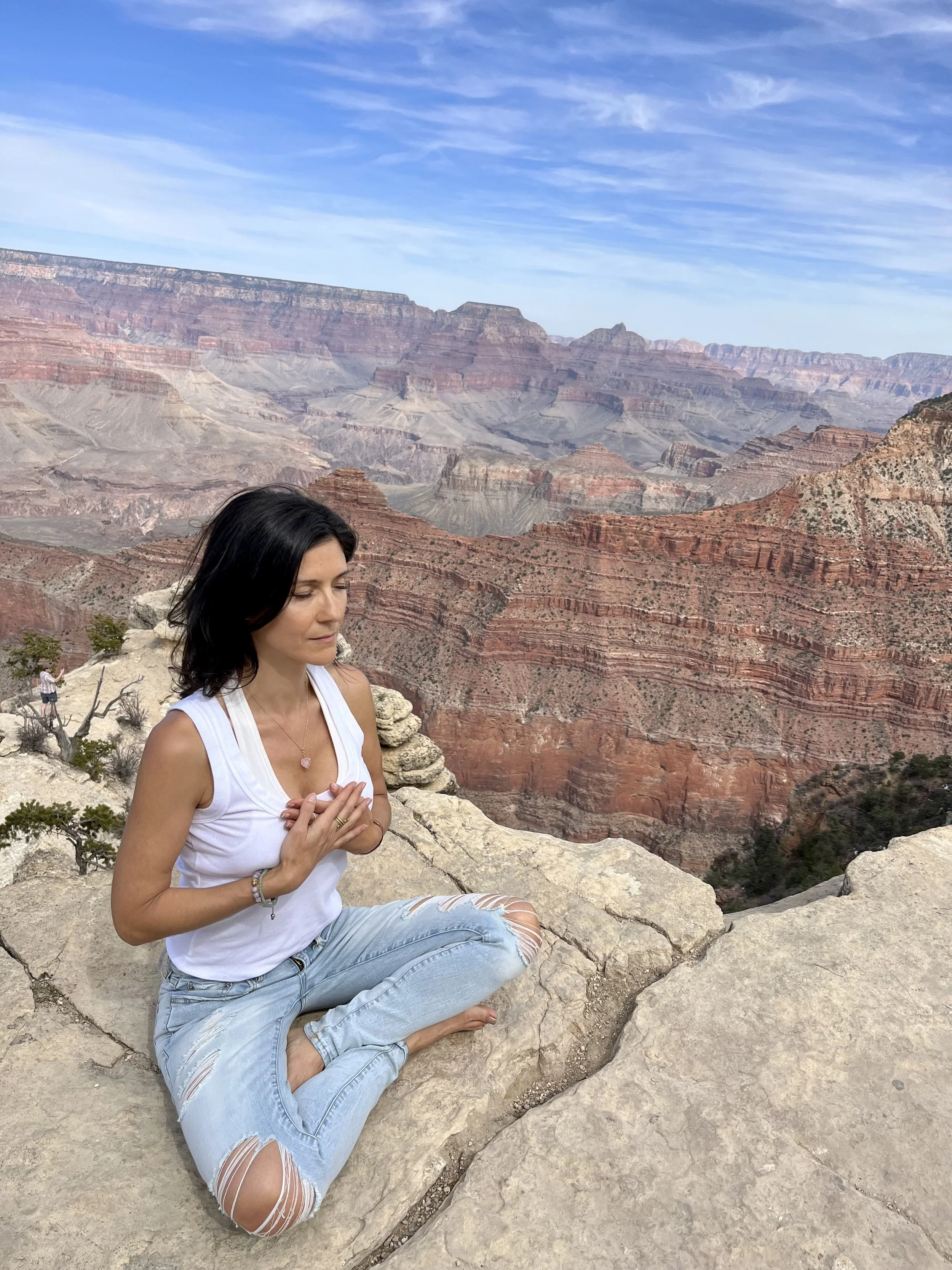 Woman meditating in the Grand Canyon