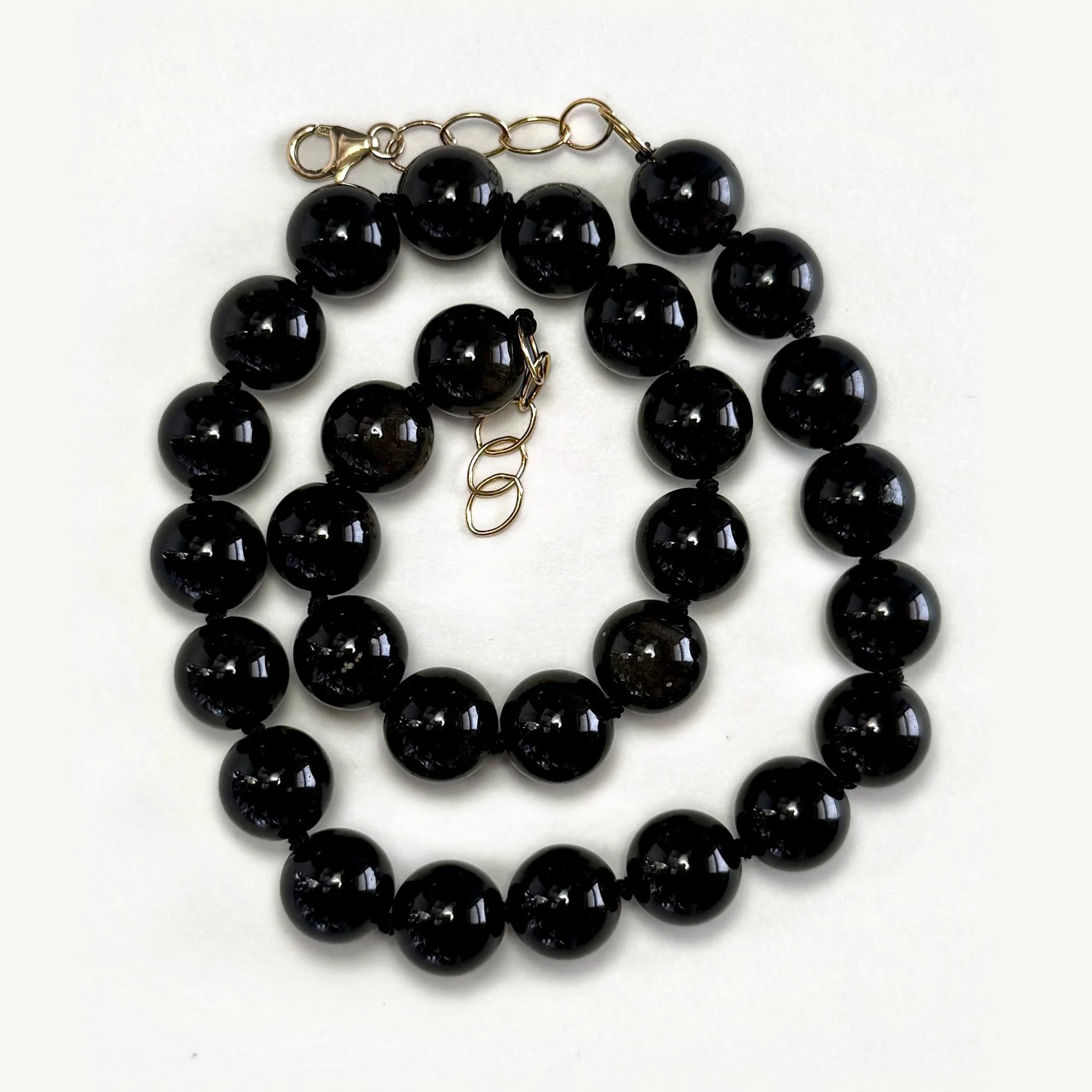 golden+obsidian+12mm+swirl.jpg