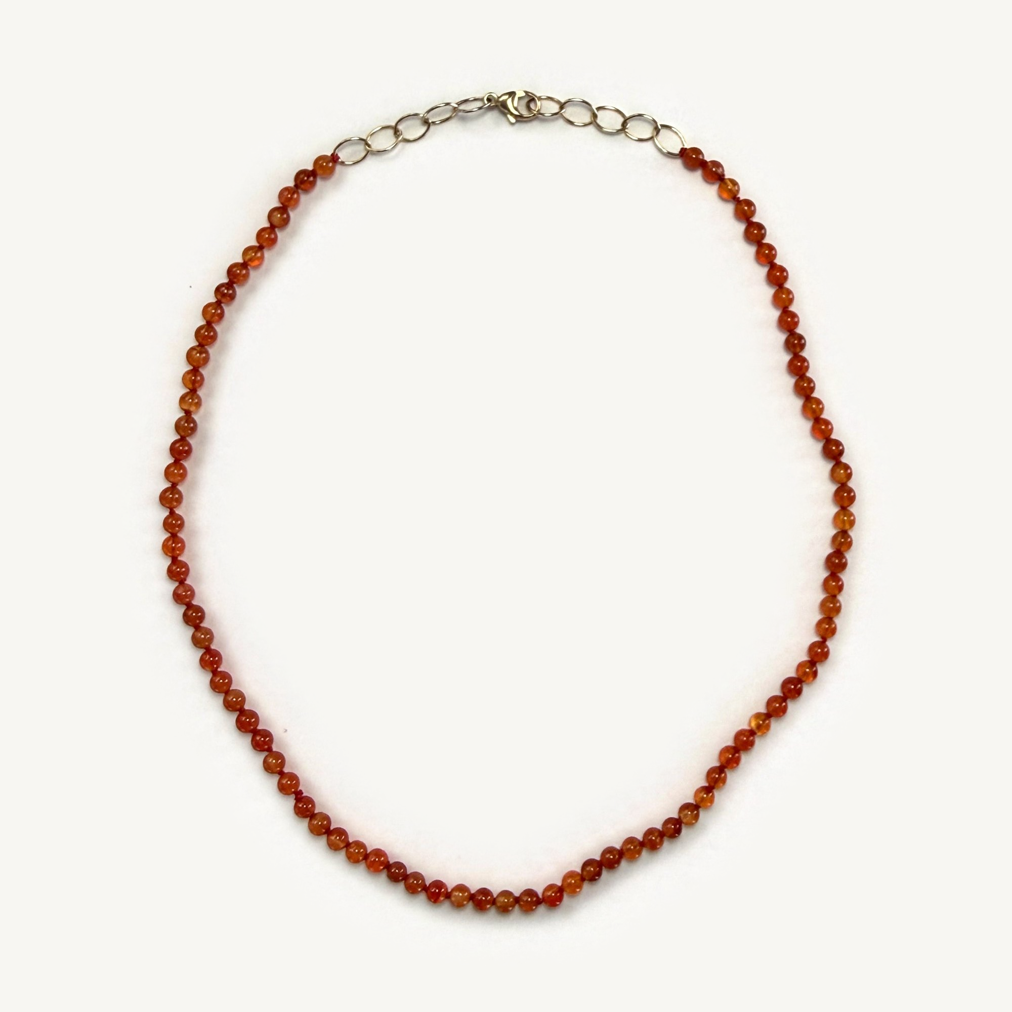 carnelian 4mm flat lay-clean.png