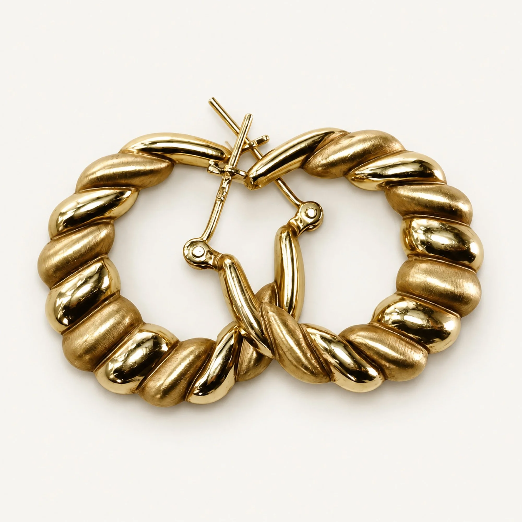 gold-hoops-intertwined.jpg
