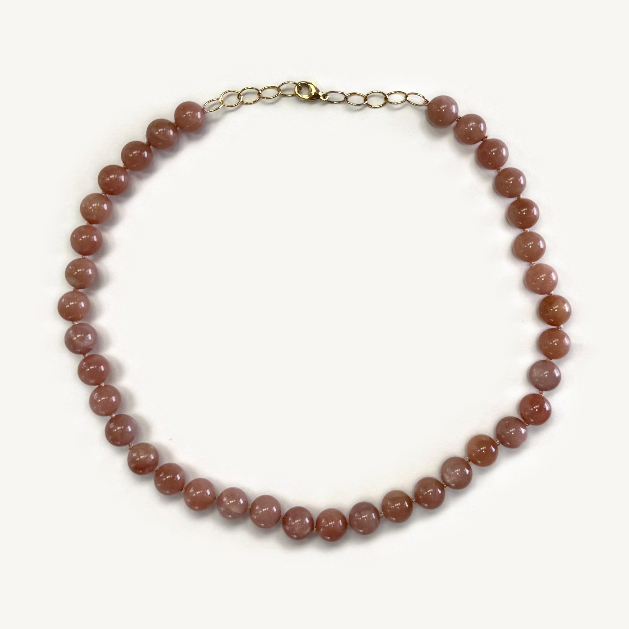peach moonstone 10mm flat lay-clean.png