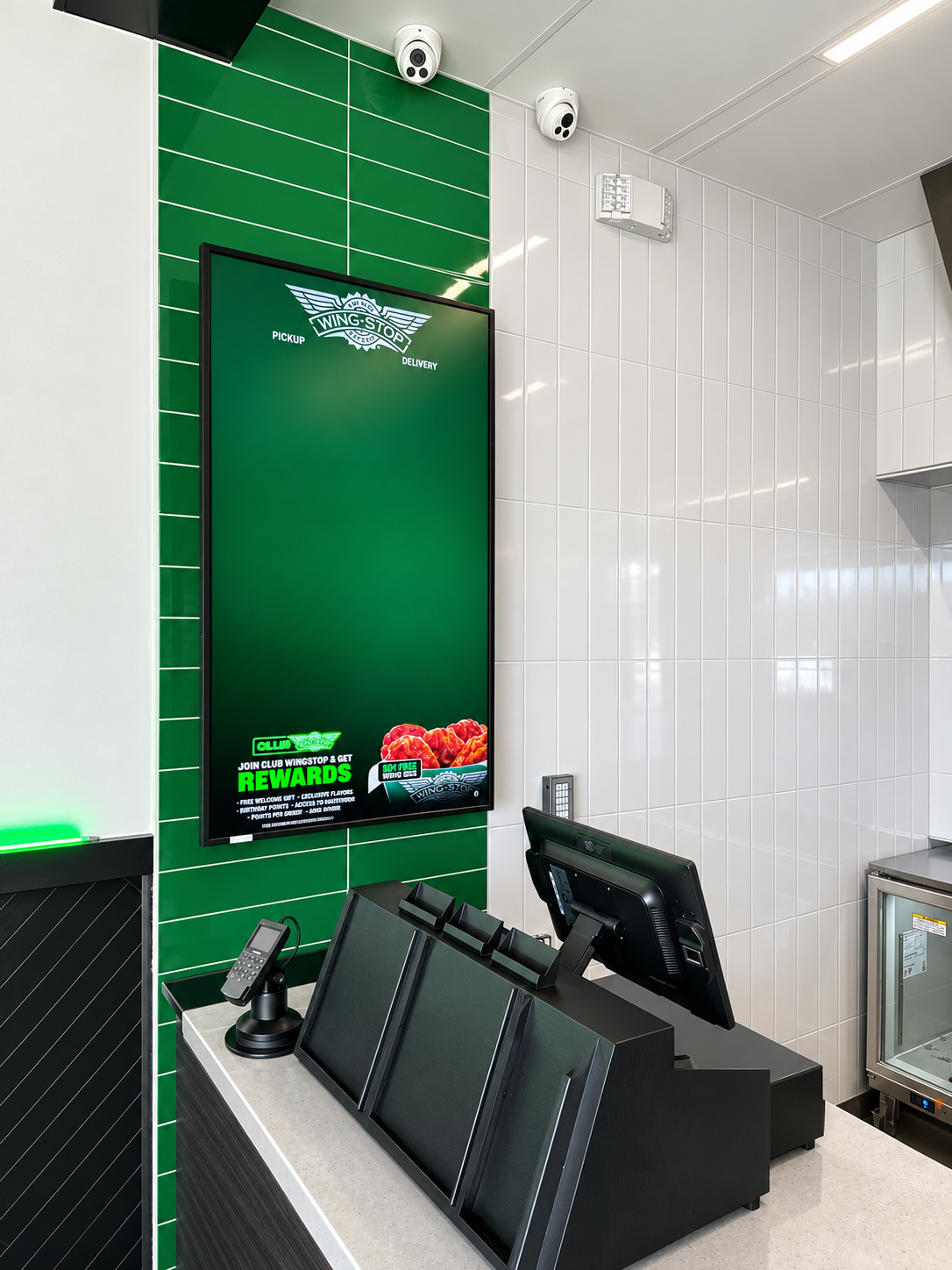 Modern Wingstop Pickup Counter.png