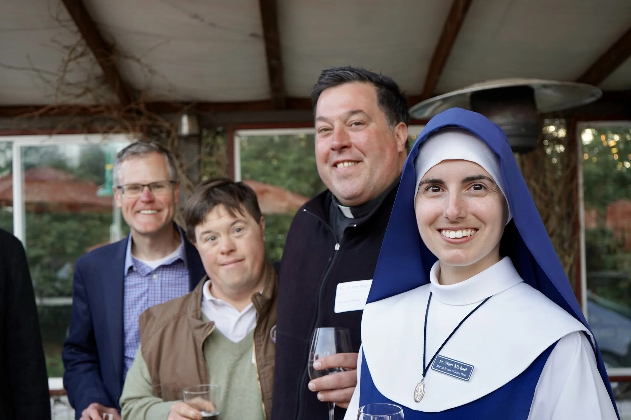 Marian Sister of Santa Rosa with parishioners at community event