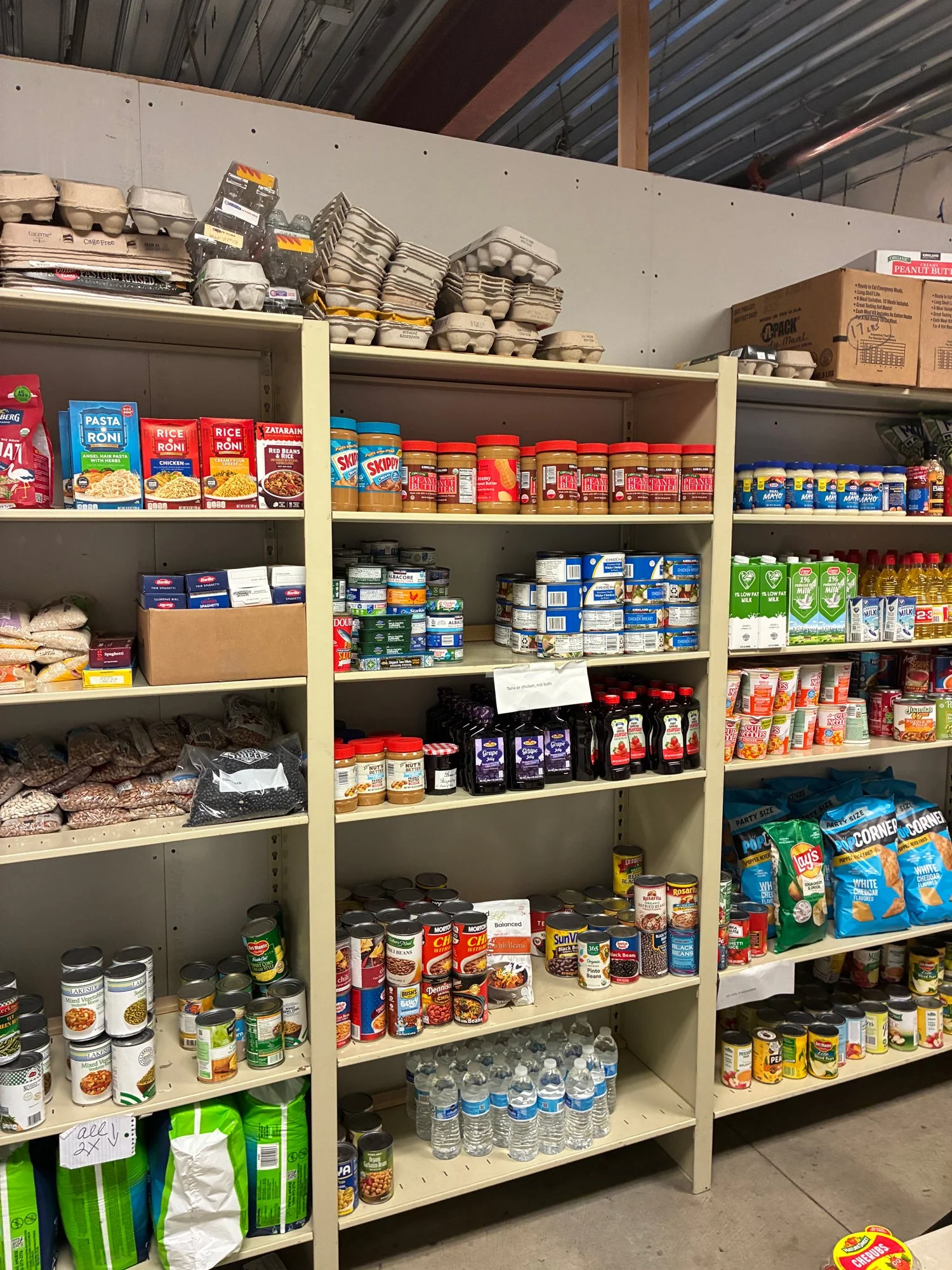 Food pantry shelves stocked at St Vincent de Paul food pantry in St Eugene's Cathedral