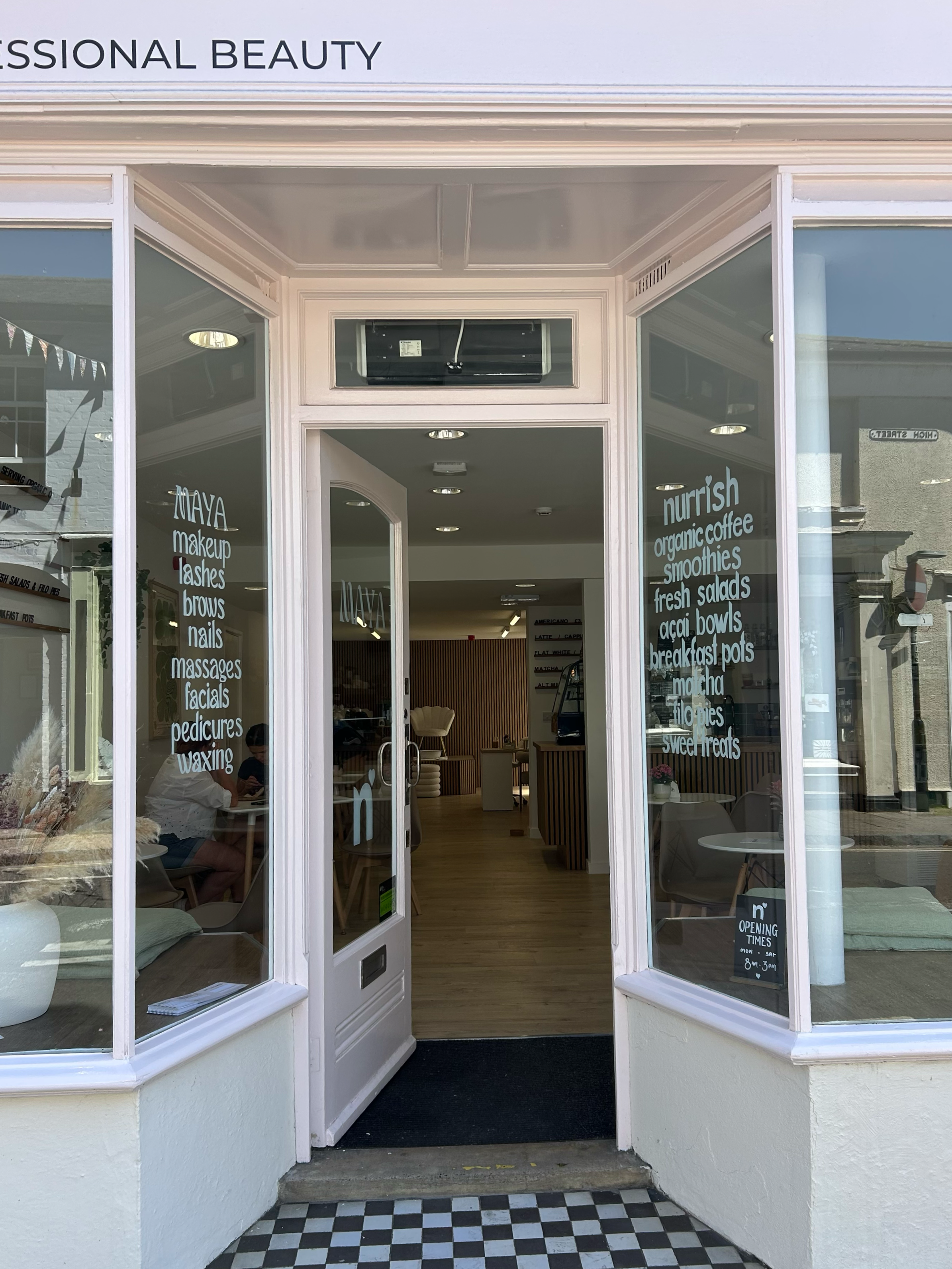 Window sign writing (written on the inside) for Maya beauty x Nurrish cafe in their respective brand fonts.