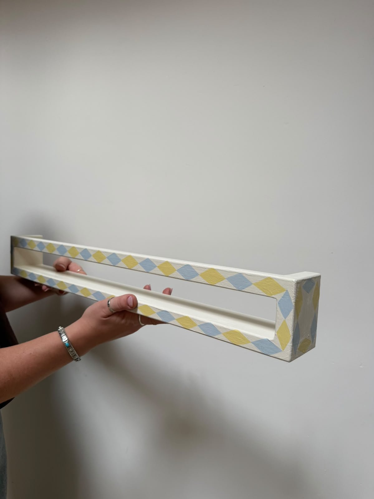 Personalised hand painted bookshelf. 