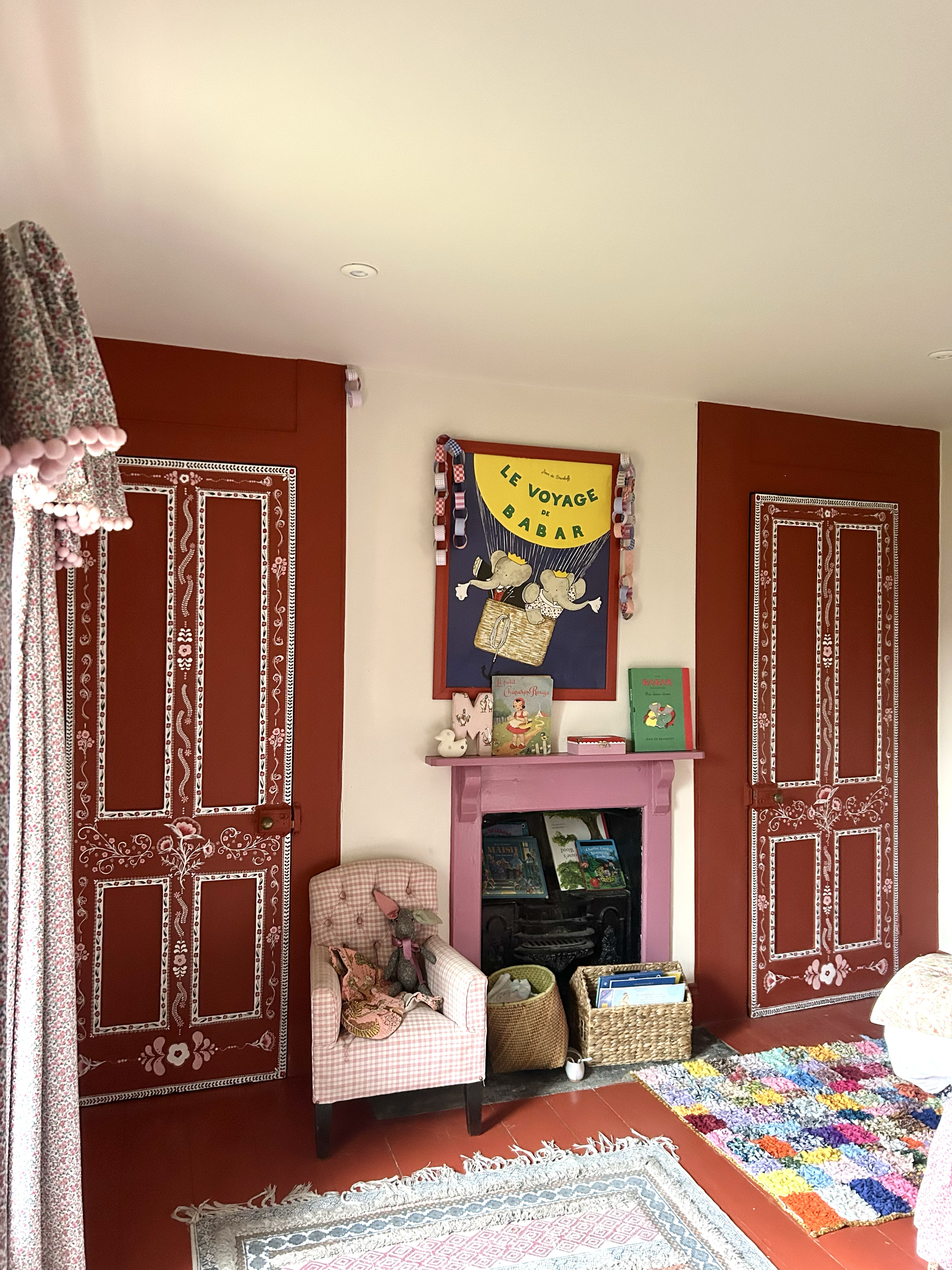 Floral folk art style hand painted doors as a matching pair for kids bedroom.
