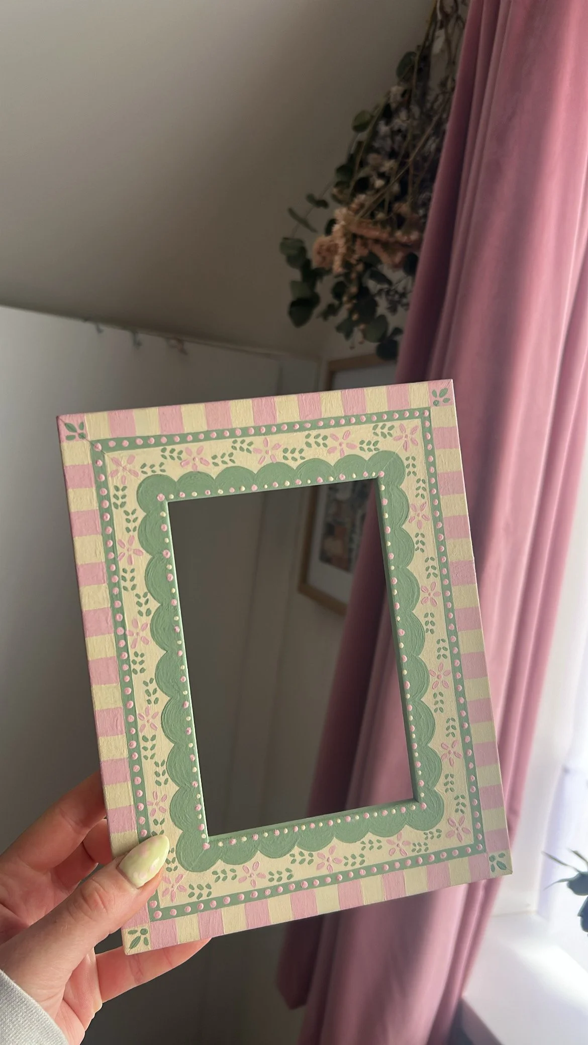Bespoke hand painted wooden frame.