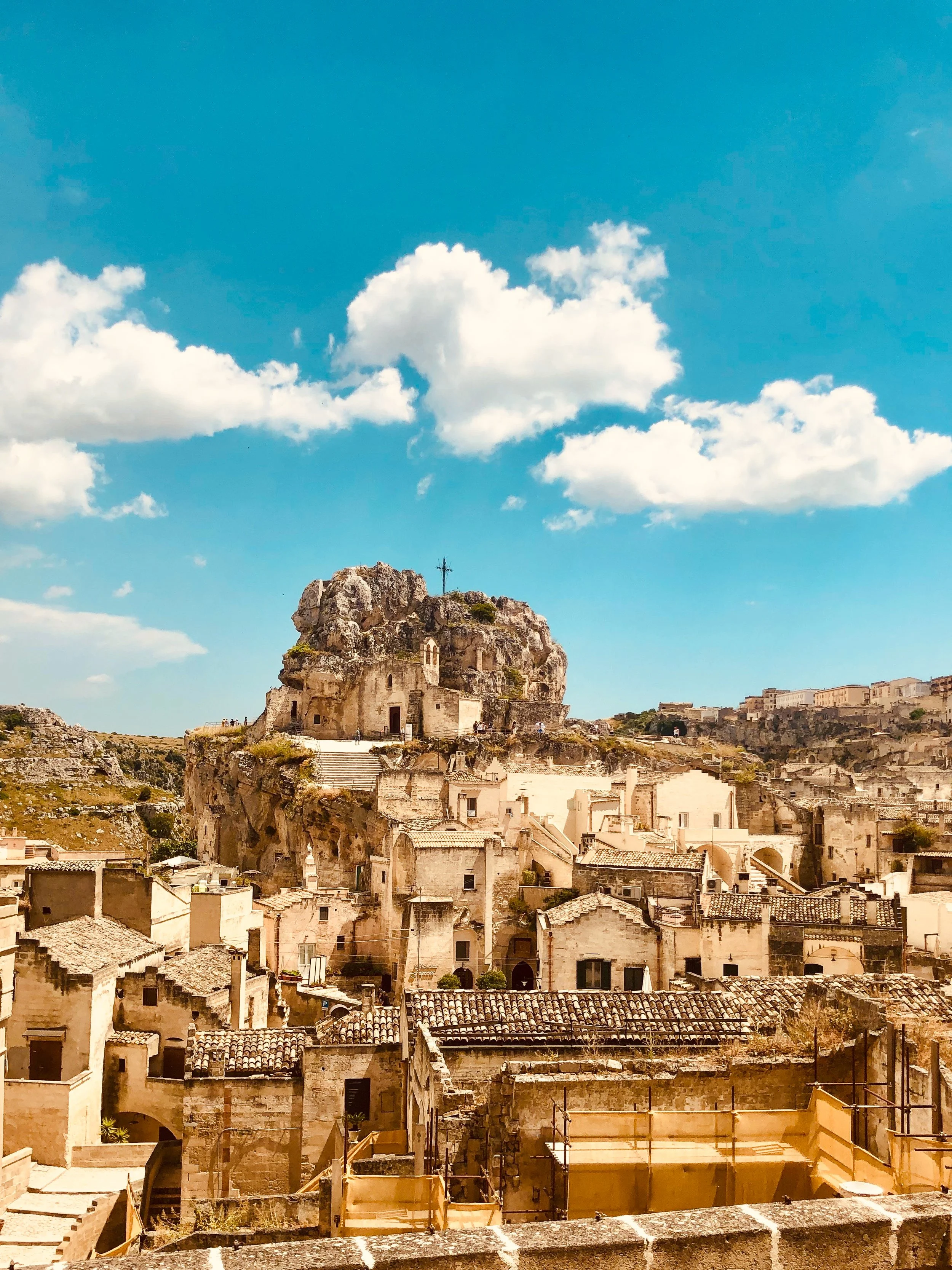 The city of Matera in the Basilicata region is one of the oldest continuously inhabited settlements of Europe. In this photo we see a slice of the "city of stones" on a blue sky day.