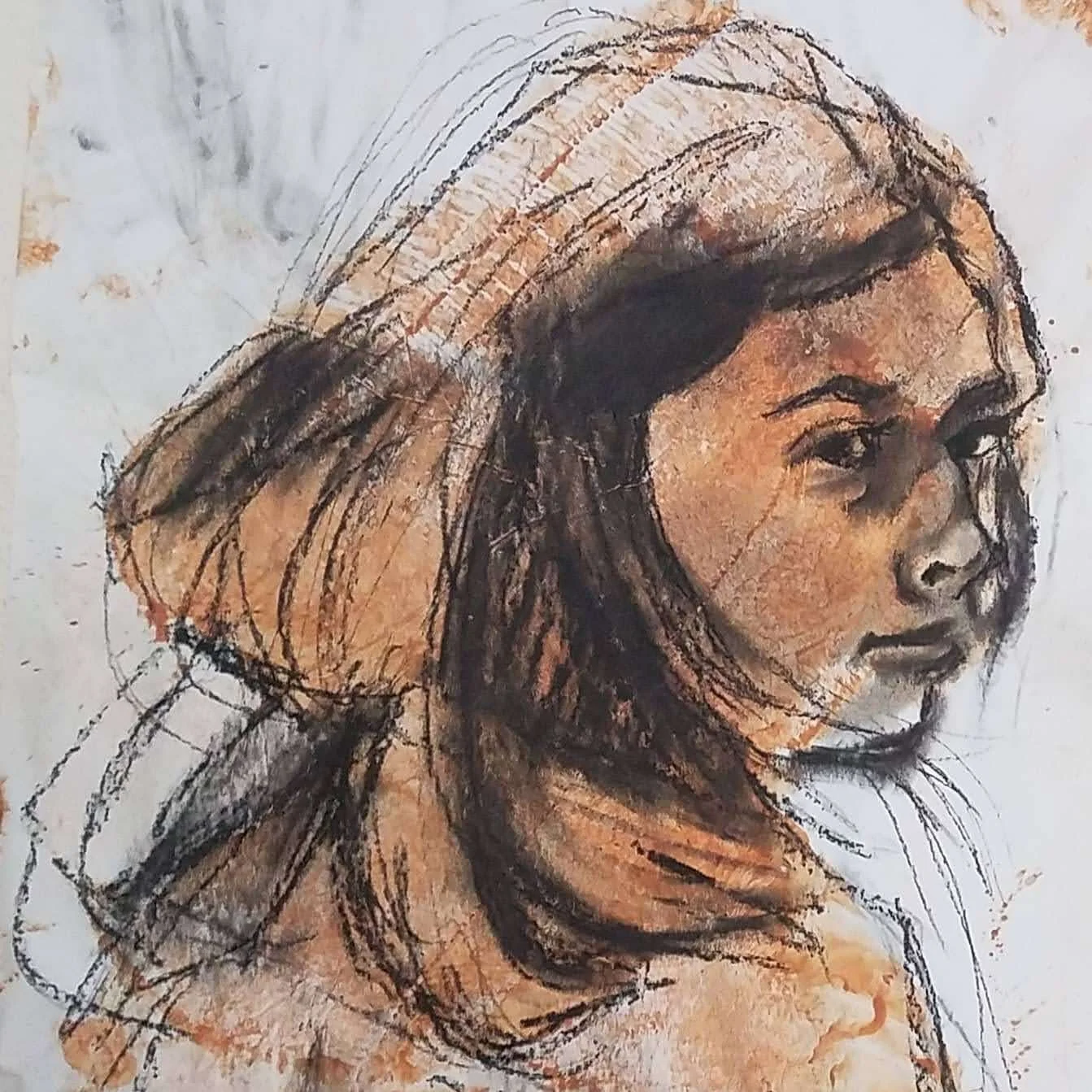 An artwork of a woman with long hair, created with charcoal sketching and local Arkansas clay as pigment.