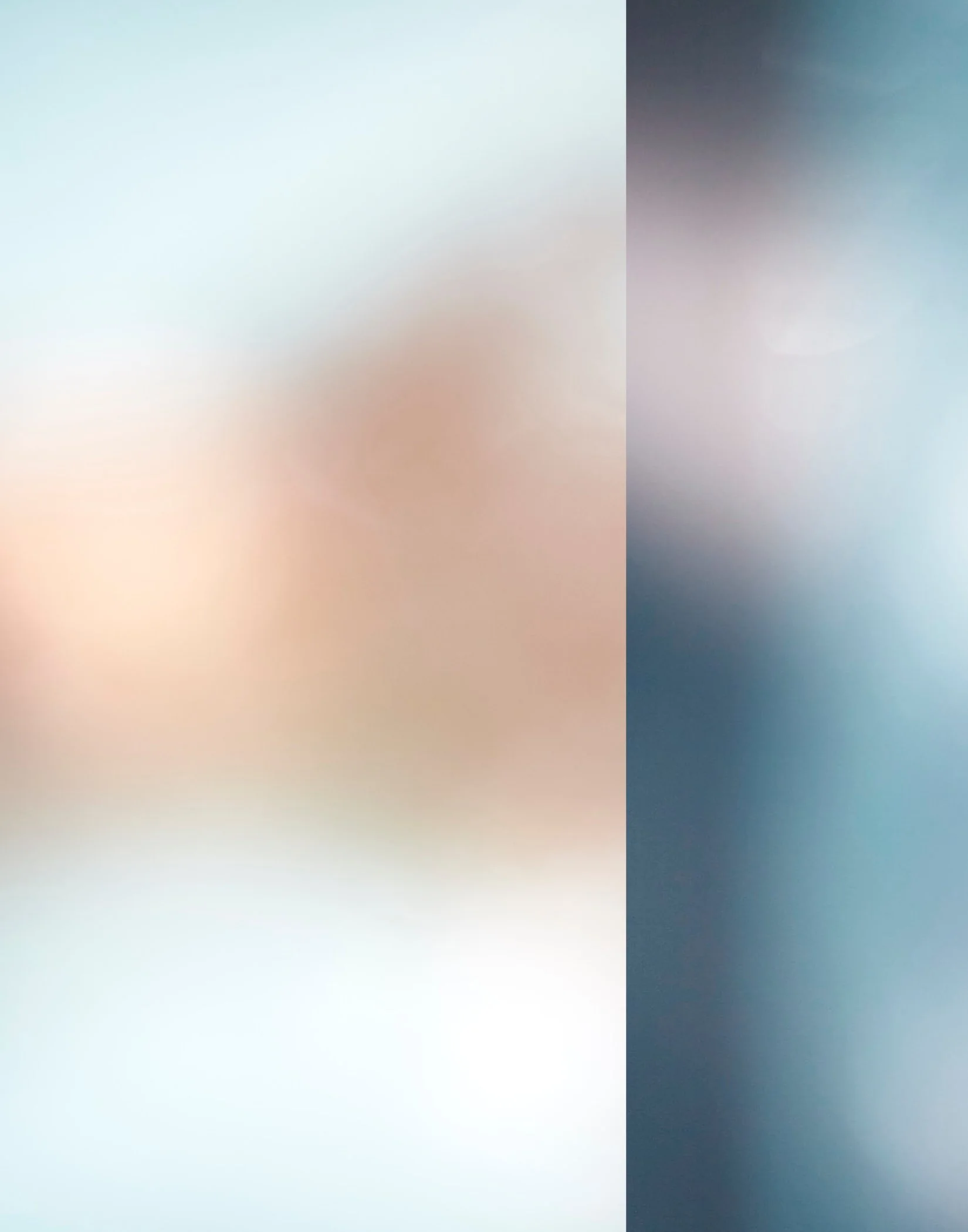 Blurred gradient colors with a dark vertical stripe on the right side.