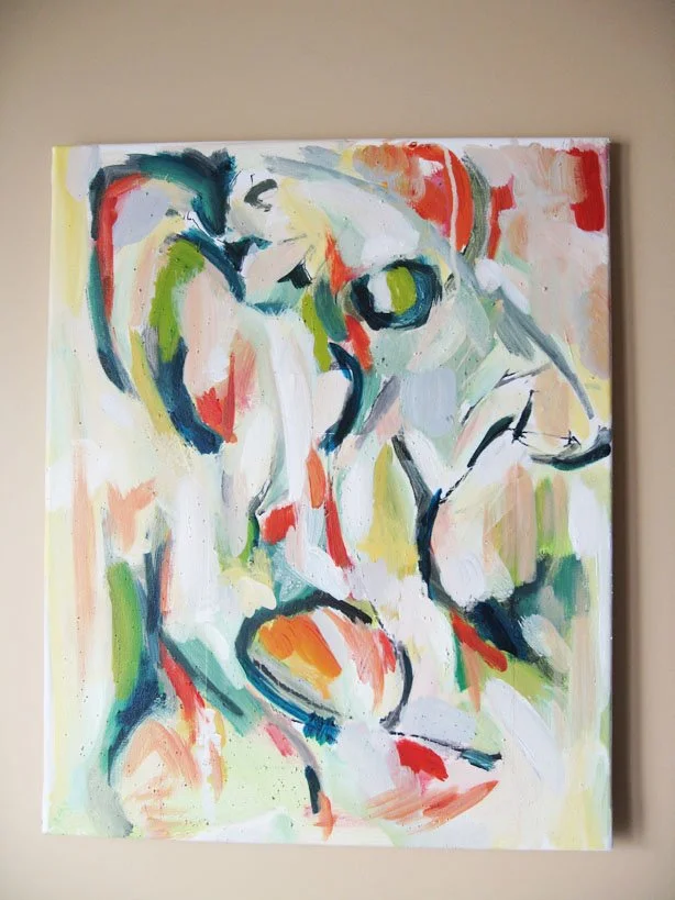 Abstract colorful painting of a face with prominent eye and facial features.