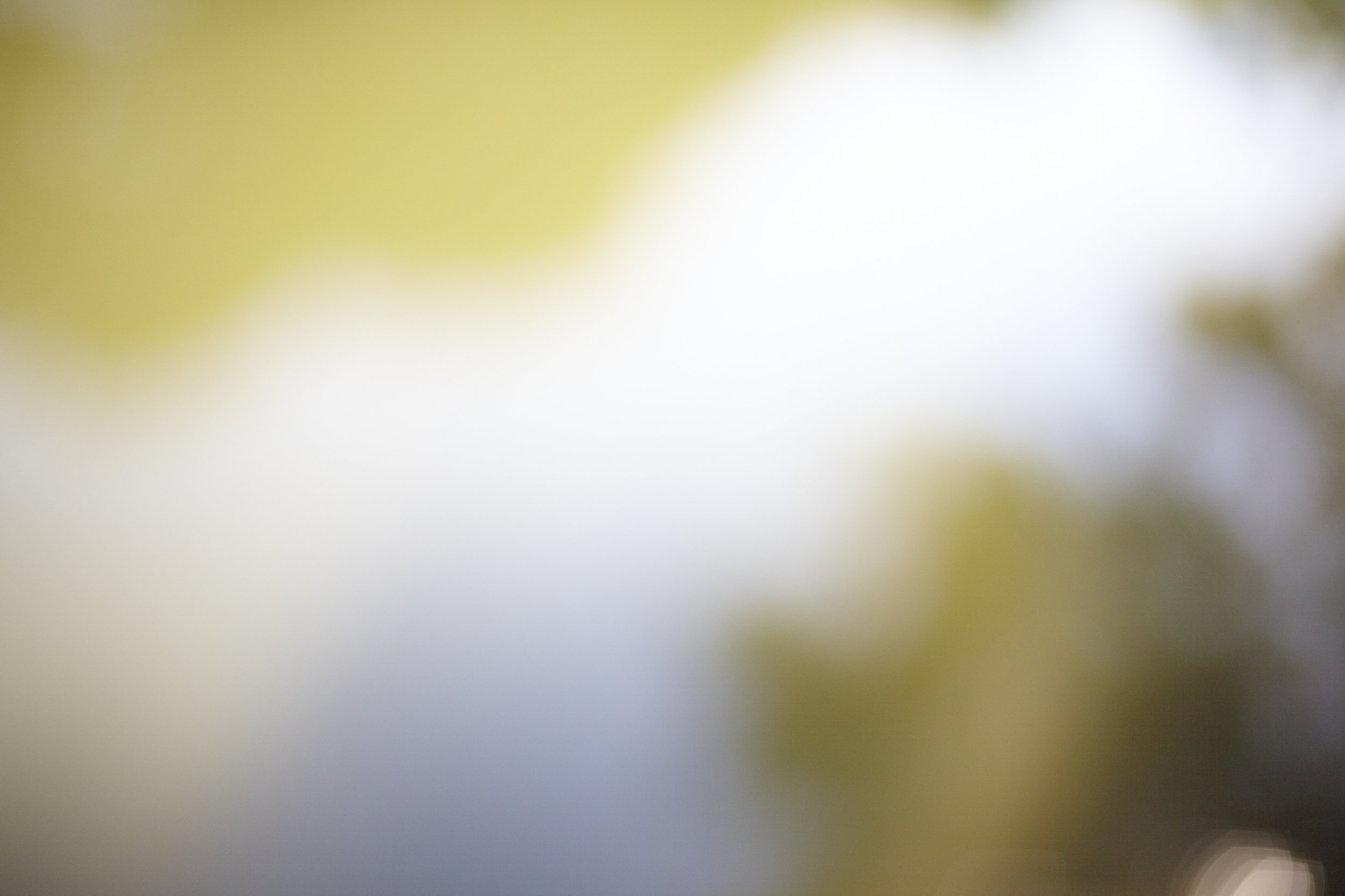 An extremely blurry photo with no clear objects or details visible.