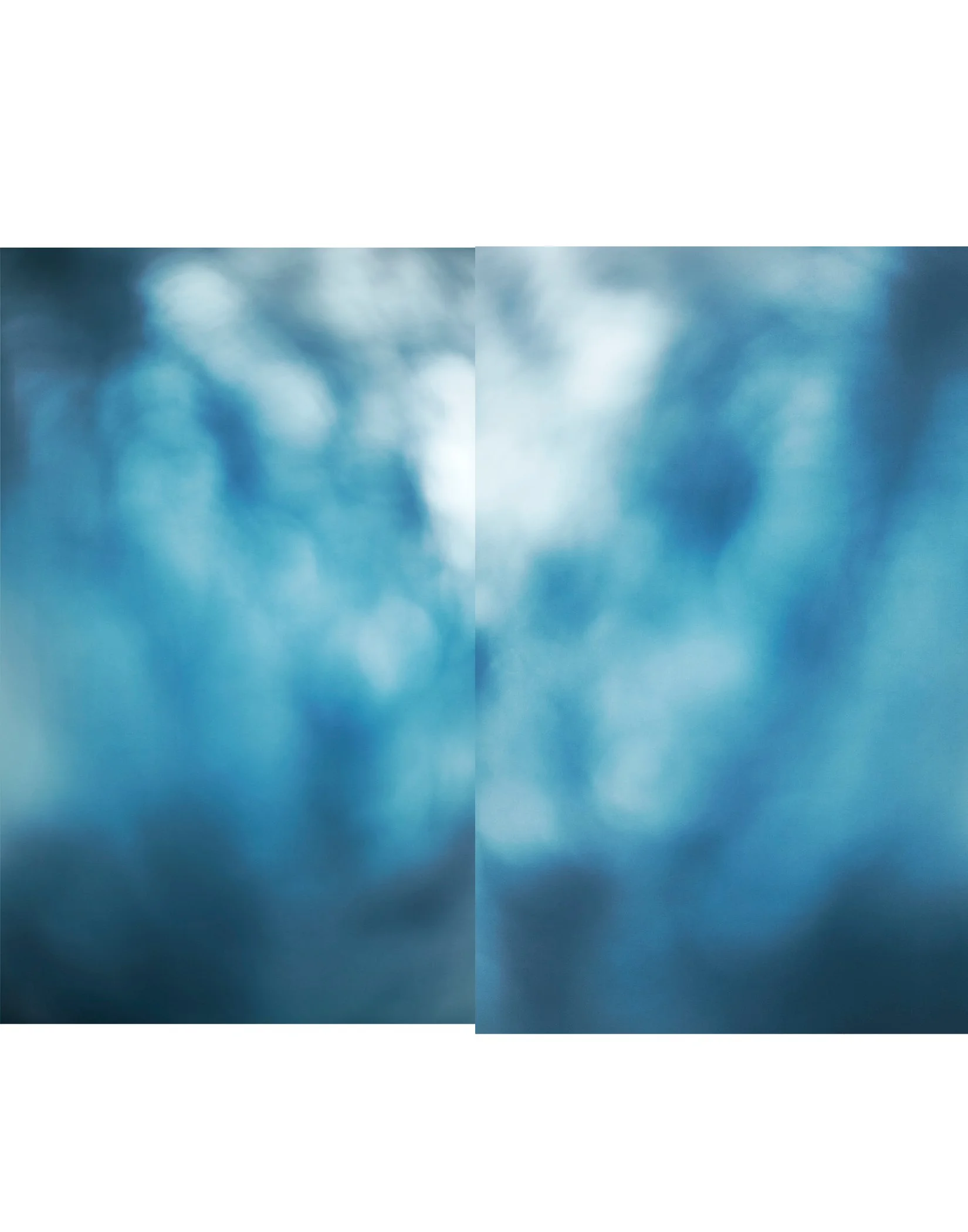 Blurred blue and white abstract background with a central vertical line.