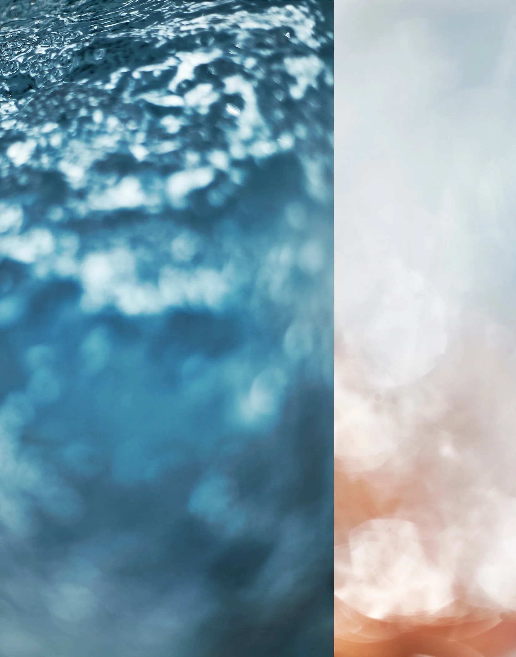 Close-up of a water surface with ripples and bubbles, transitioning from blue on the left to a pale orange hue on the right.